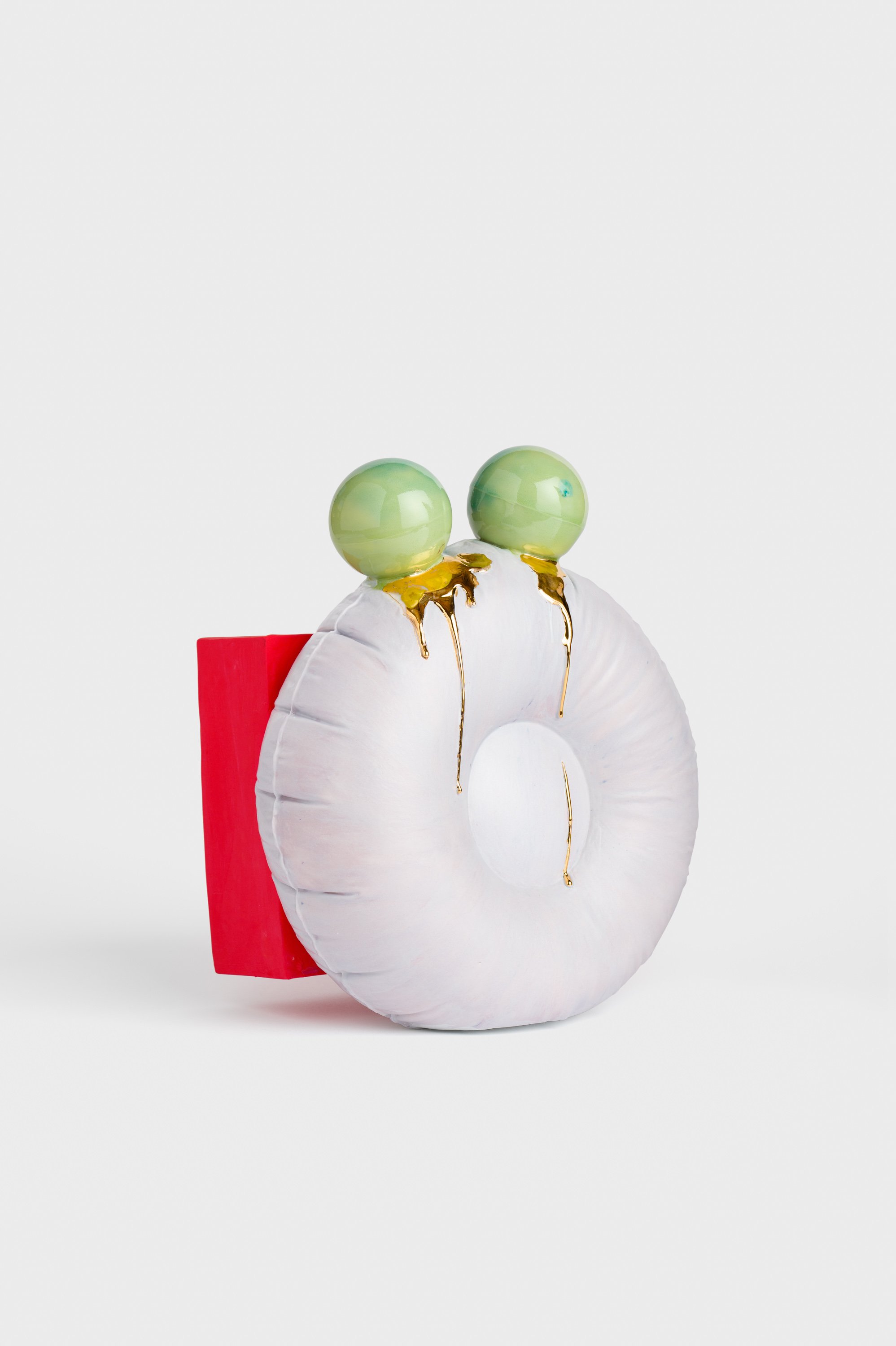 B-side, 2026. Porcelain, glaze, gold lustre, epoxy, acrylic, nylon yarn. 31h x 26w x 17d cm. Image: Mark Pokorny
