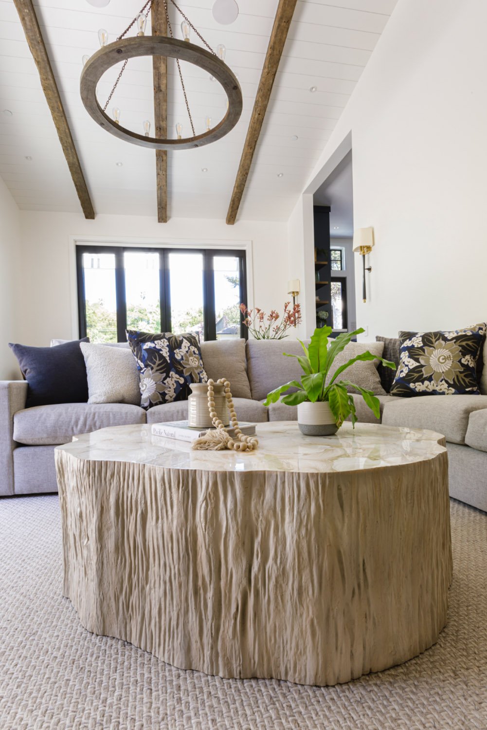 Natural wooden coffee table and wooden ceiling beams.jpg