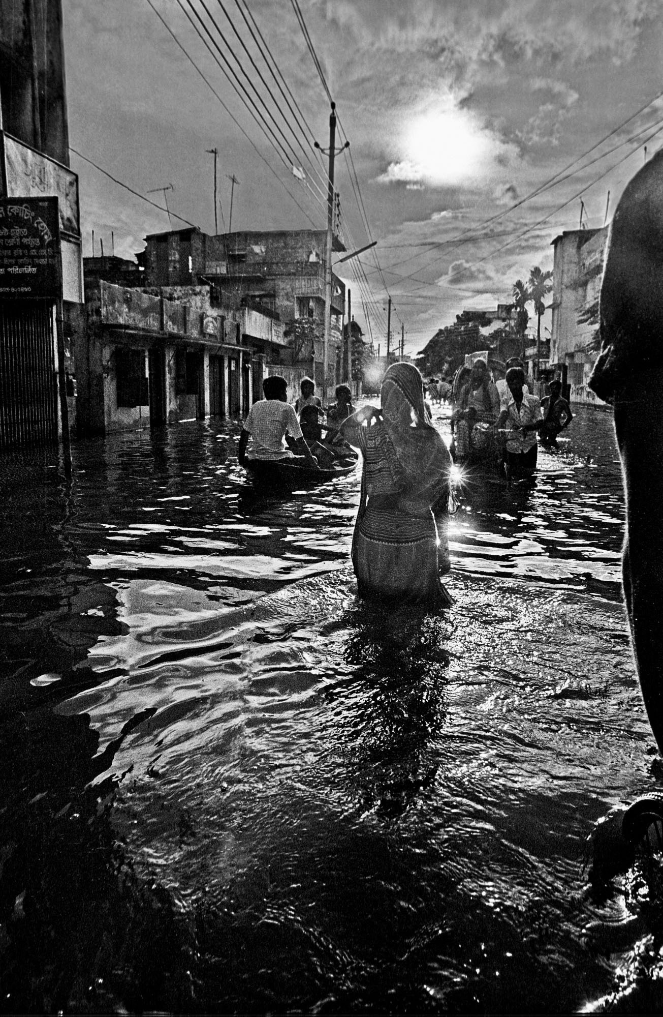 12. Woman wading in flood water Shahidul Alam.jpg