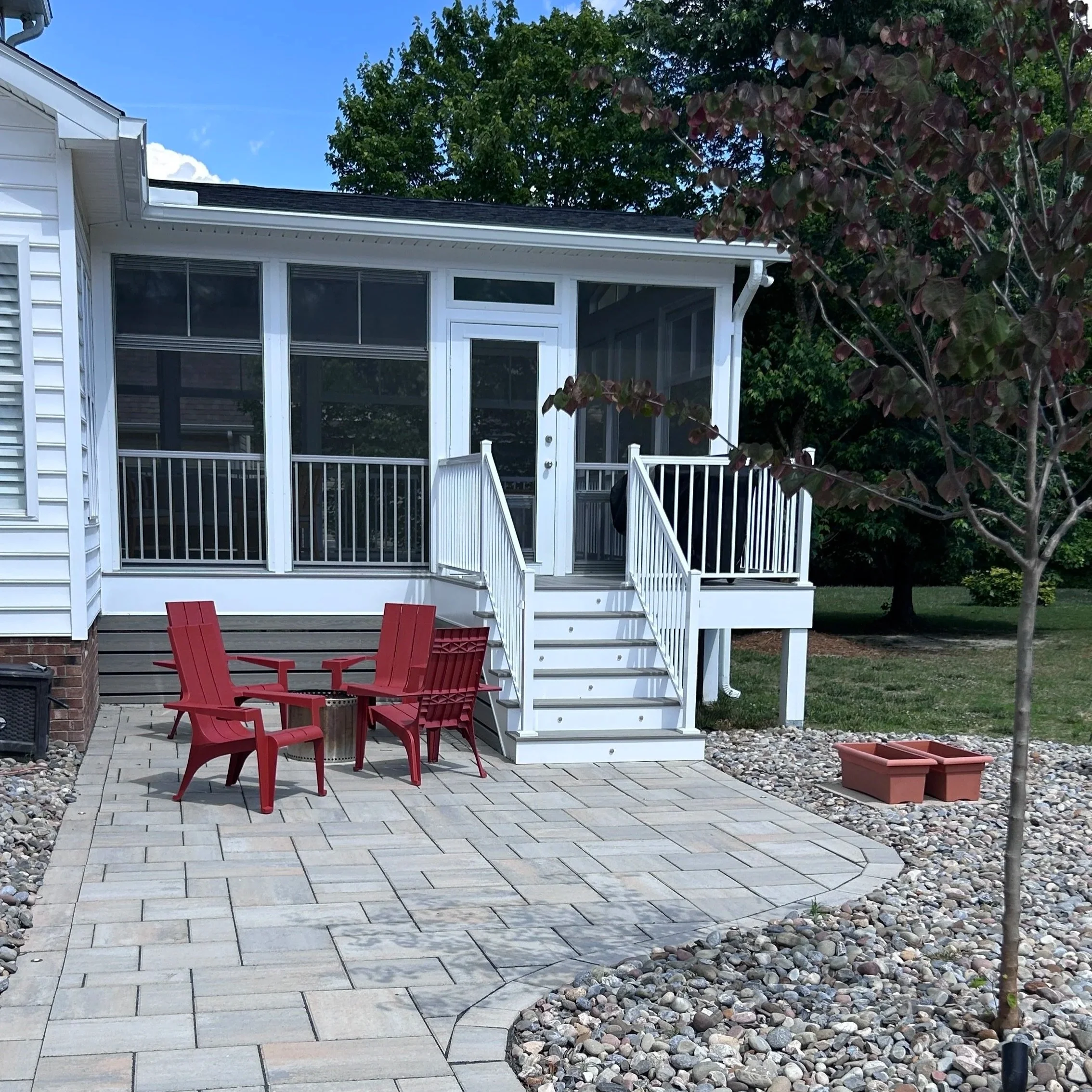 16 x 20 custom 3-season room with vaulted ceiling and EZE-Breeze windows completed in Wendell, NC. Project includes in-ceiling can lights, fan, updated outlets and switches, wooden ceiling, and low voltage lighting package. This client also opted for