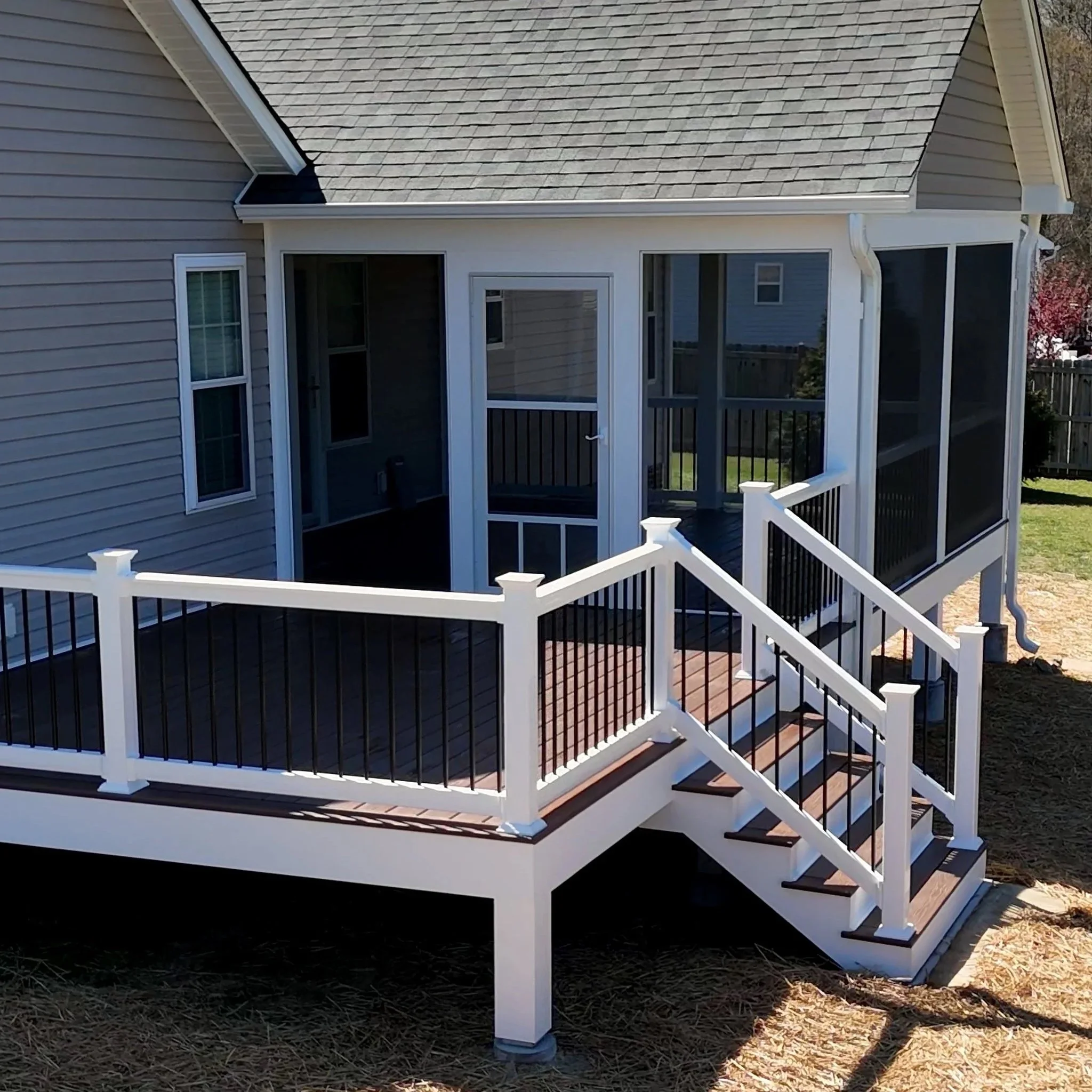 This 16 x 16 screen porch was completed in Zebulon, NC. Complete with painted pine ceiling, crown molding, ScreenEZE screen system, screen door with doggy door, vinyl rails with aluminum pickets, can lights and ceiling fan. The whole project was wrap