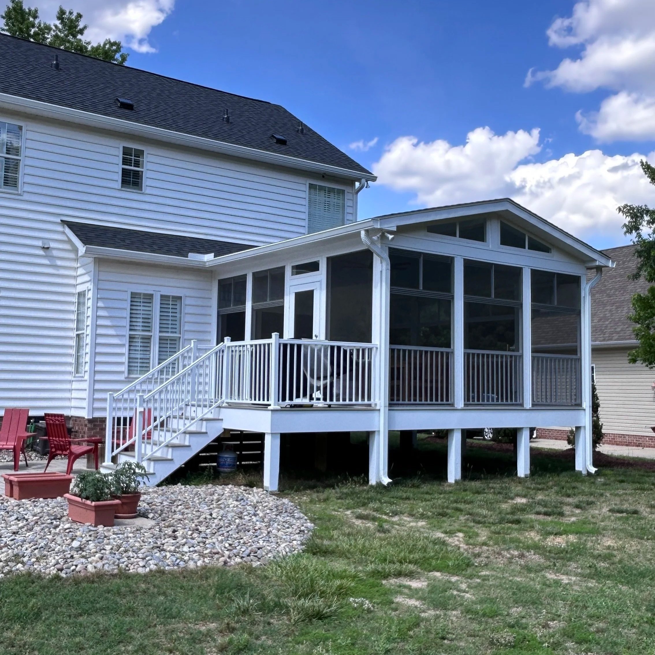 16 x 20 custom 3-season room with vaulted ceiling and EZE-Breeze windows completed in Wendell, NC. Project includes in-ceiling can lights, fan, updated outlets and switches, wooden ceiling, and low voltage lighting package. This client also opted for