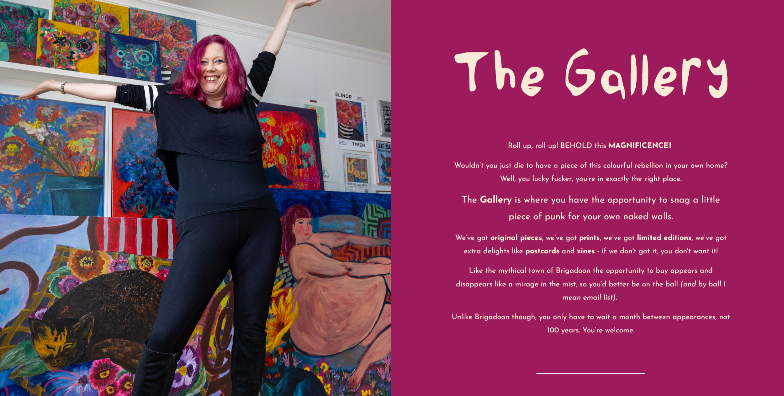 A woman with pink hair smiling and raising her arms at an art gallery filled with colorful paintings.