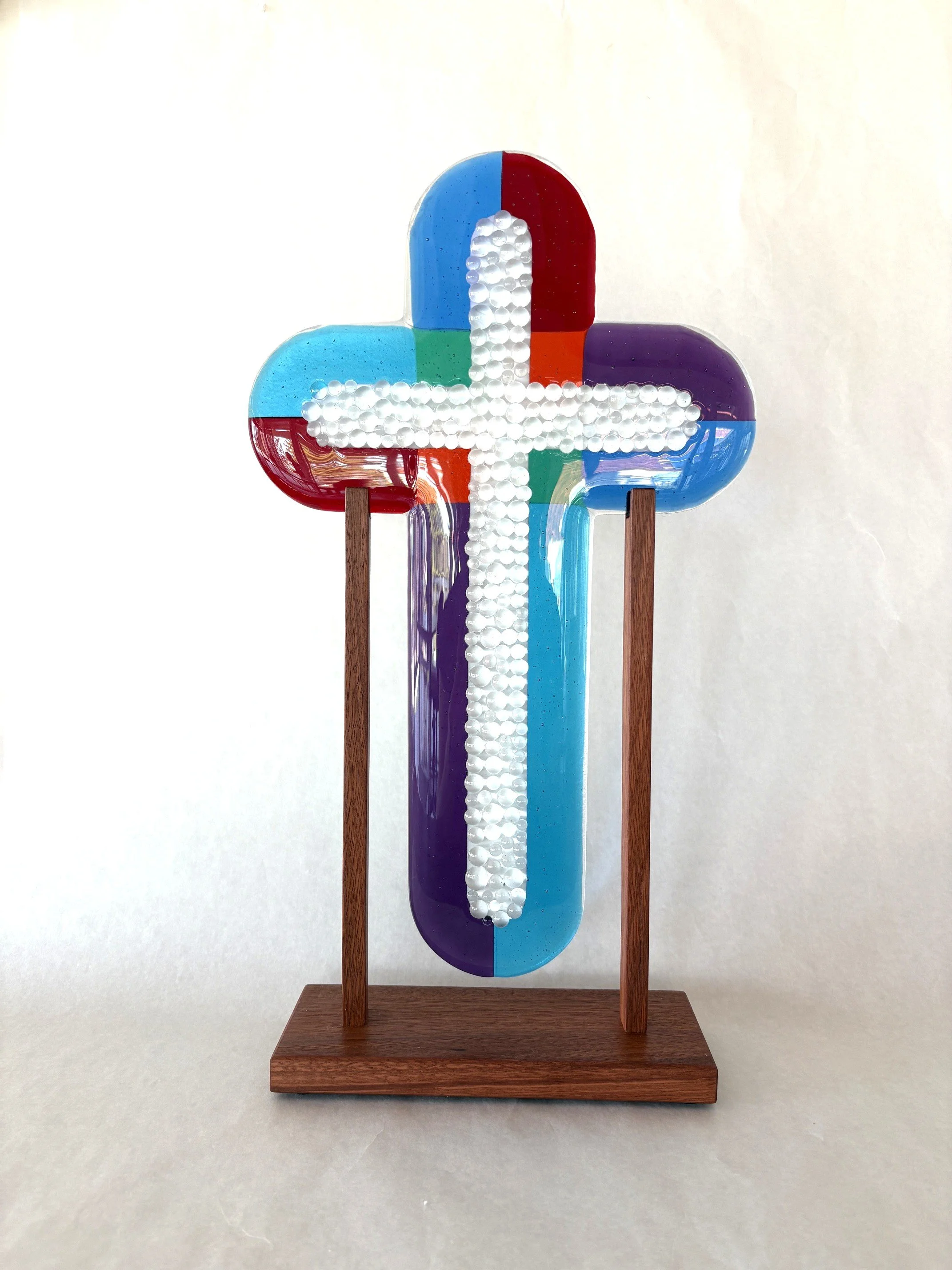 400mm cross, turquoise, emerald, true blue, violet and red with a cluster of clear cabochons.JPG
