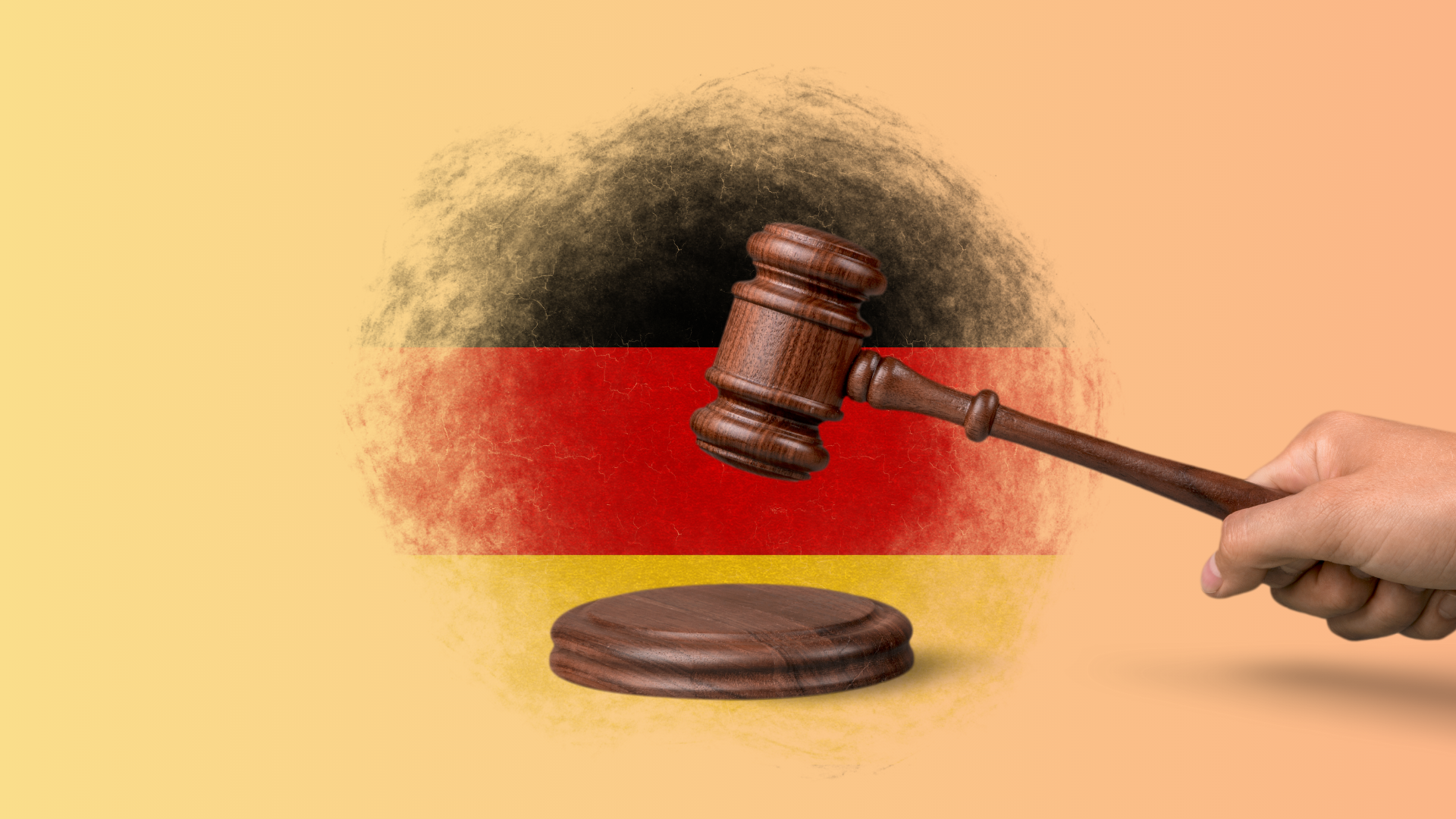 A gavel with the German flag in the background