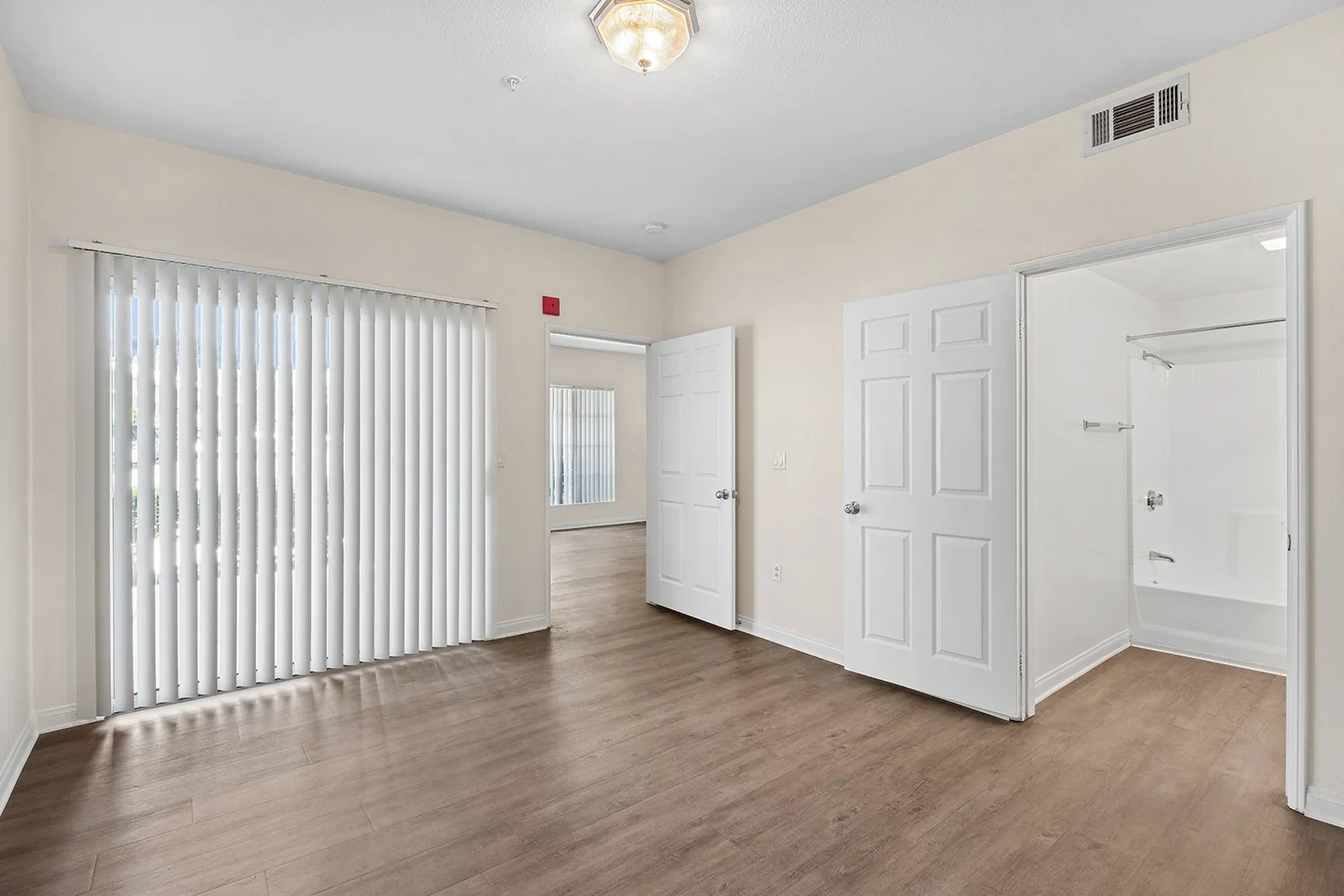 Spacious bedroom in Crescent Heights Apartment Homes