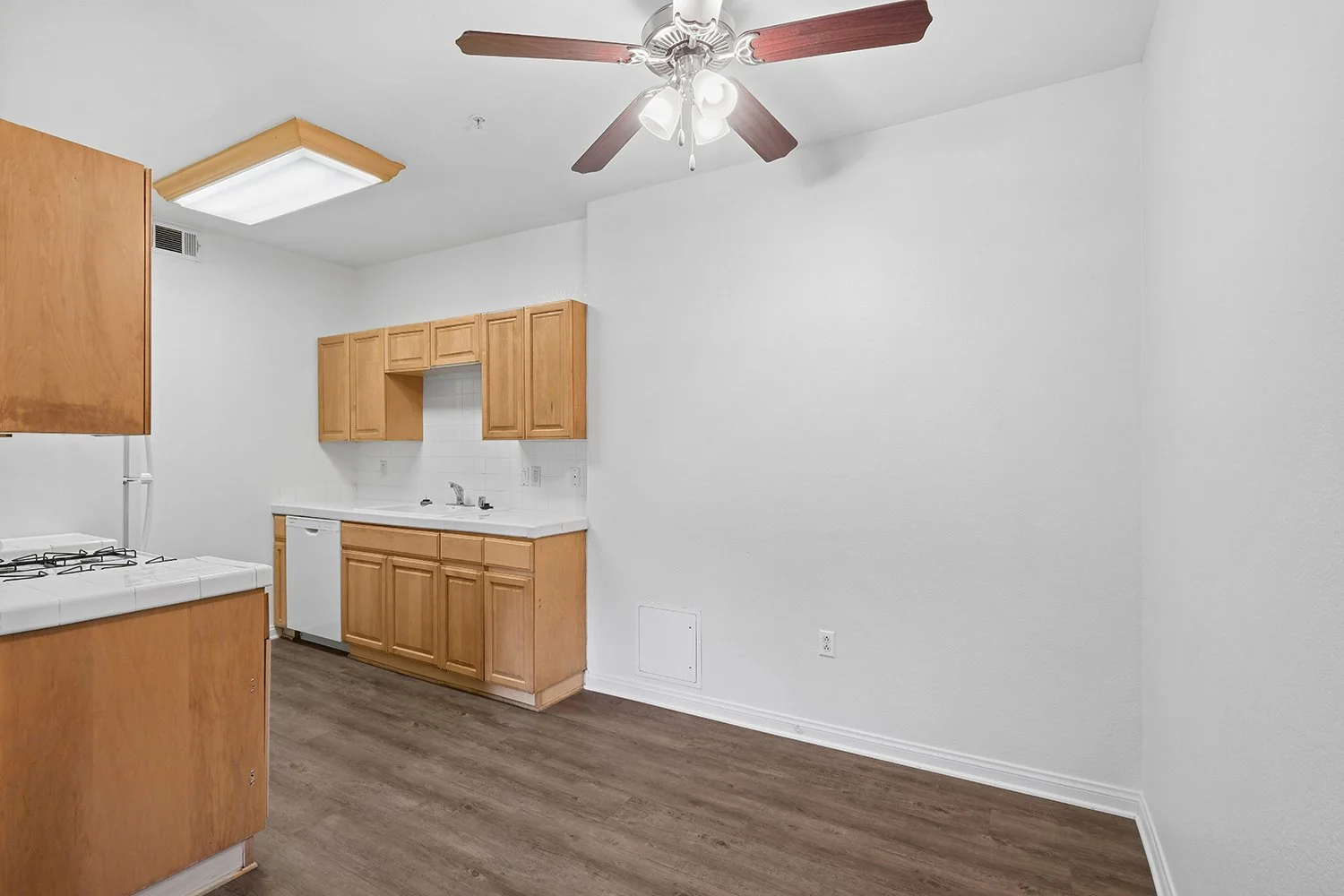 Kitchen &amp; Dining Nook in Crescent Heights Apartment
