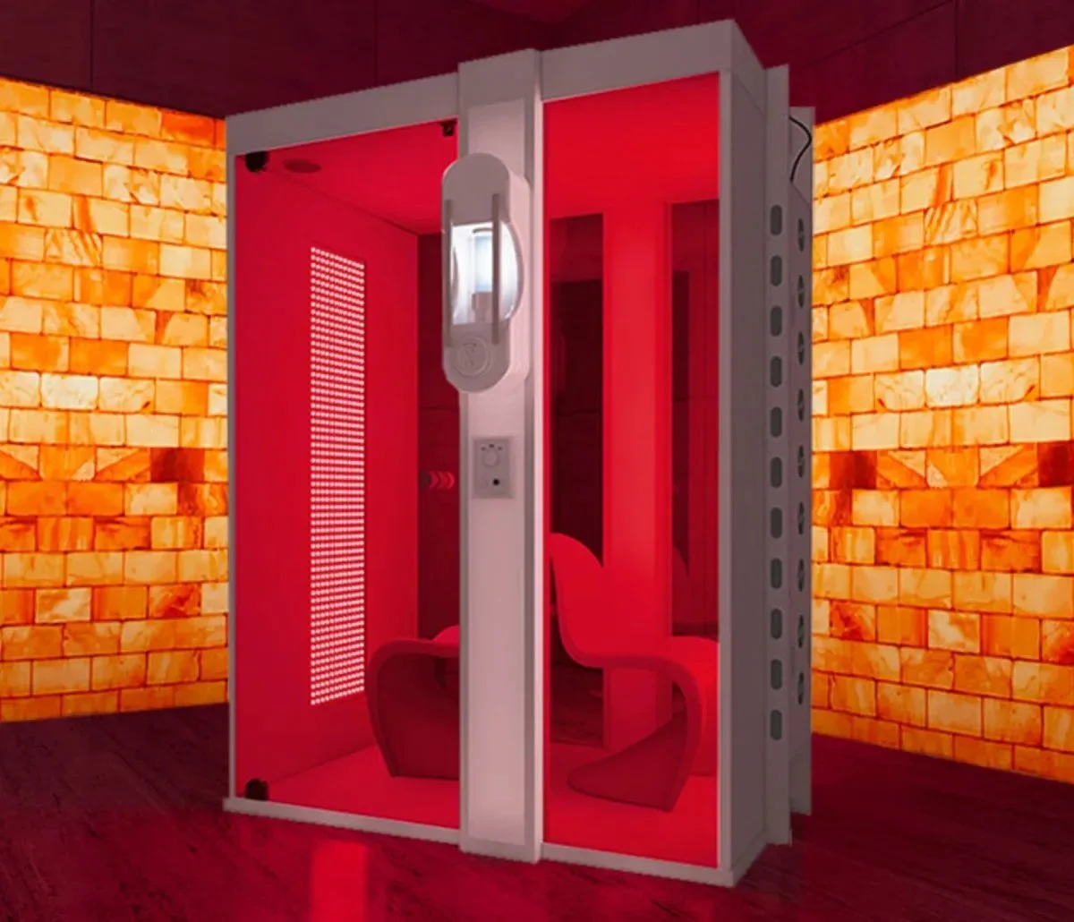 Vitality Booth combining red light therapy and salt therapy to promote skin repair and reduce inflammation
