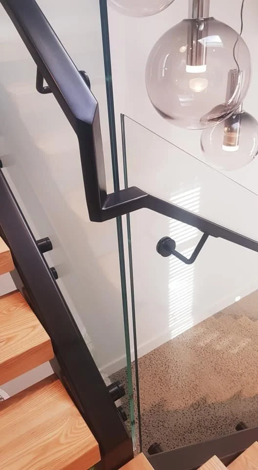 steel-and-timber-stairs-with-handrails-on-glass-orewa-18.jpeg