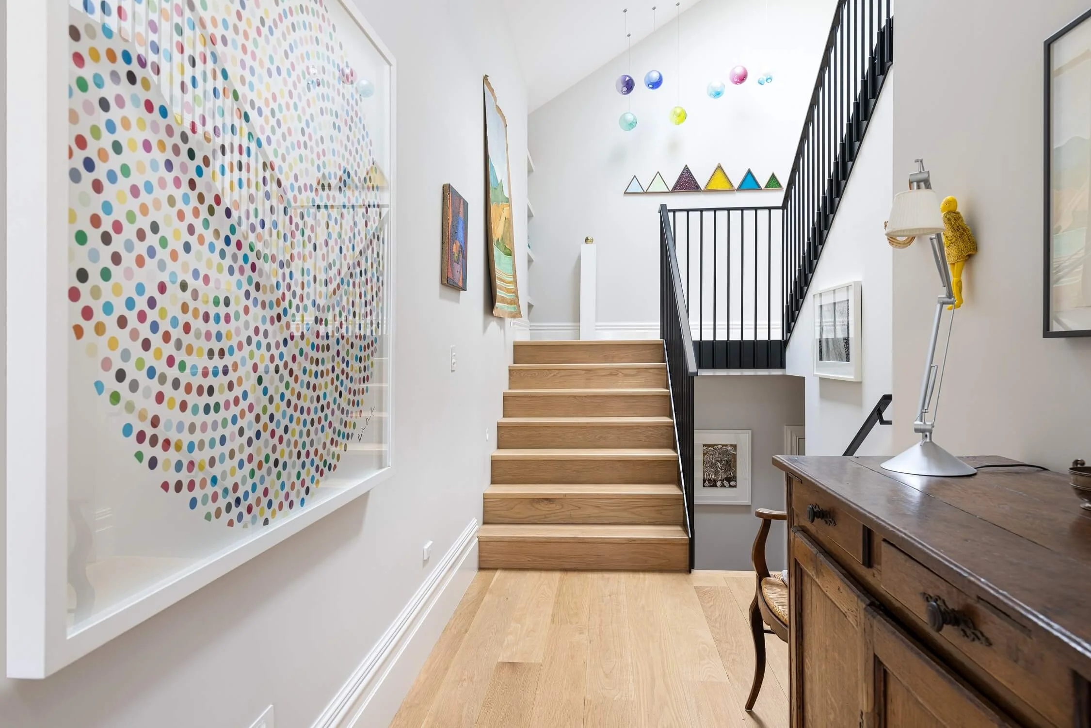 Residential Steel Balustrades in Auckland - coloured black, leading up staircase to the 2nd floor