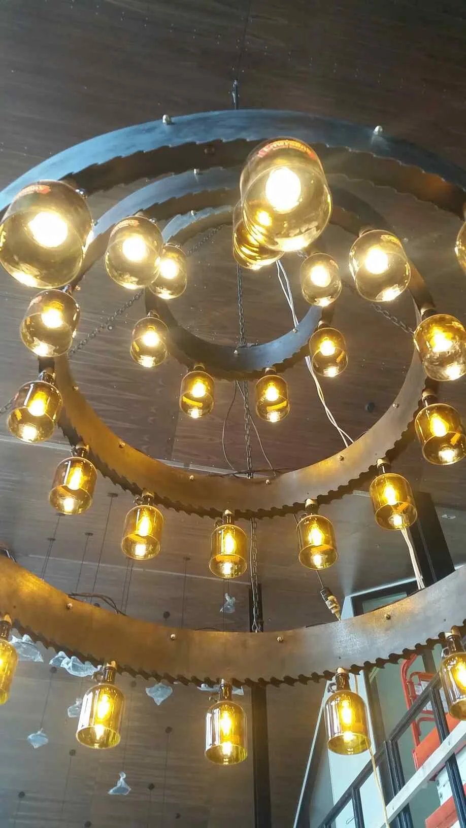 steel feature lighting made from an old steel saw and curved into a spiral - nz