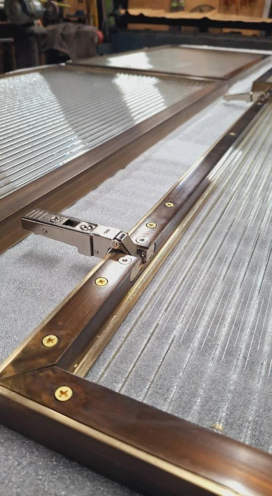 closeup of brass-framed kitchen door