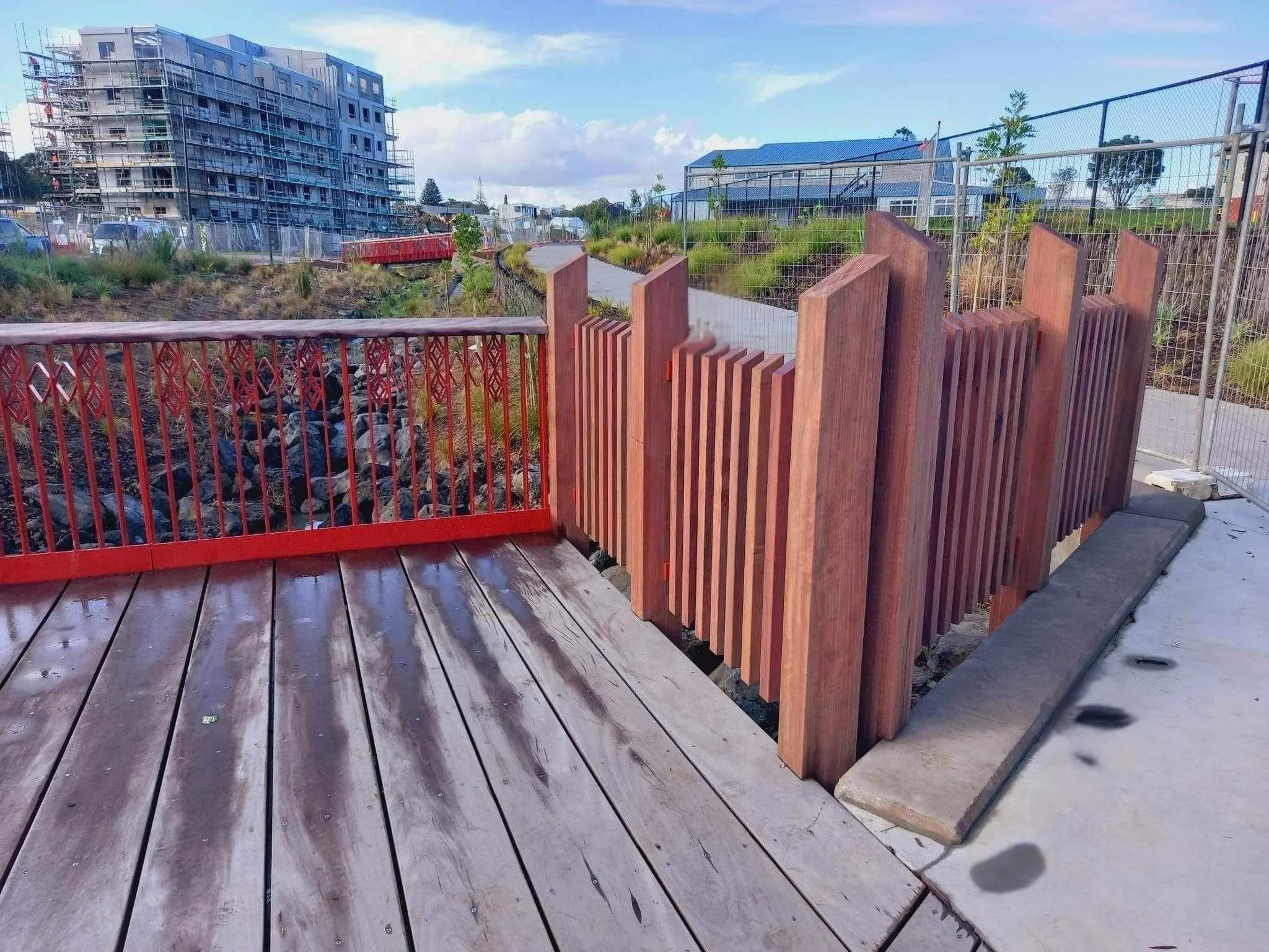 red steel and purple heart timber fencing