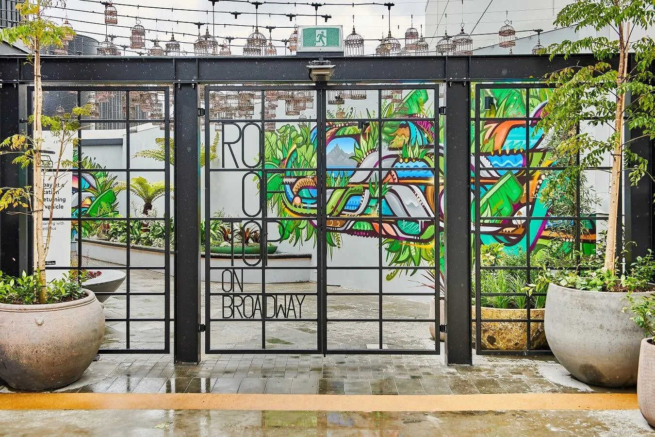 Steel screen doors to one of the areas of the rooftop at Westfield Newmarket