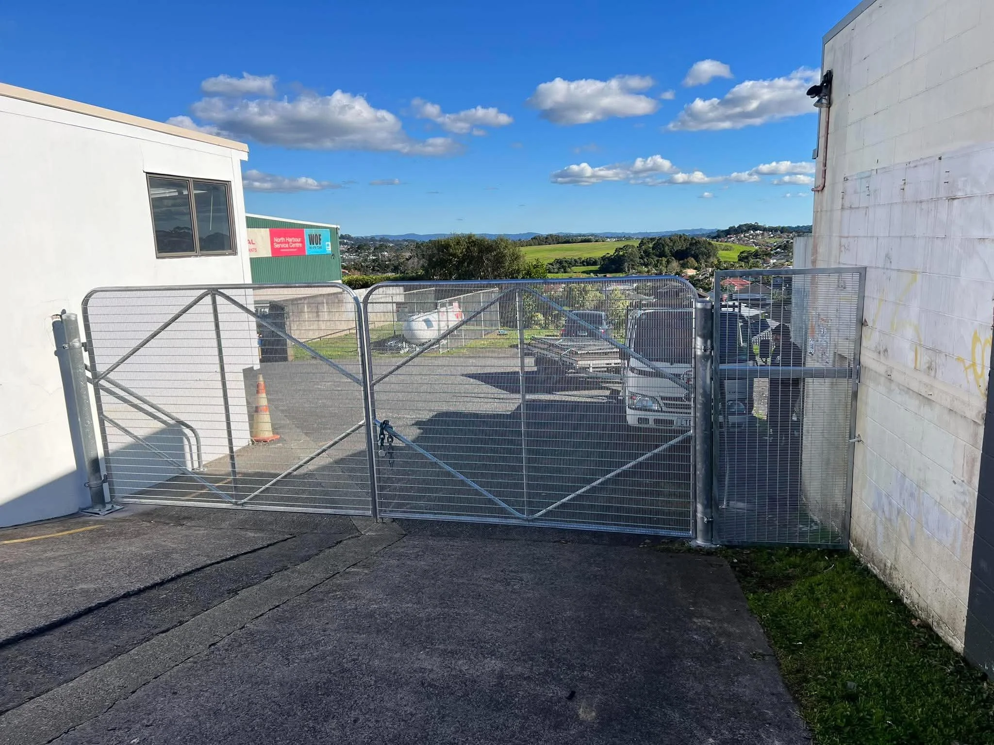 Galvanised fencing with perforated fill at Pine Hill