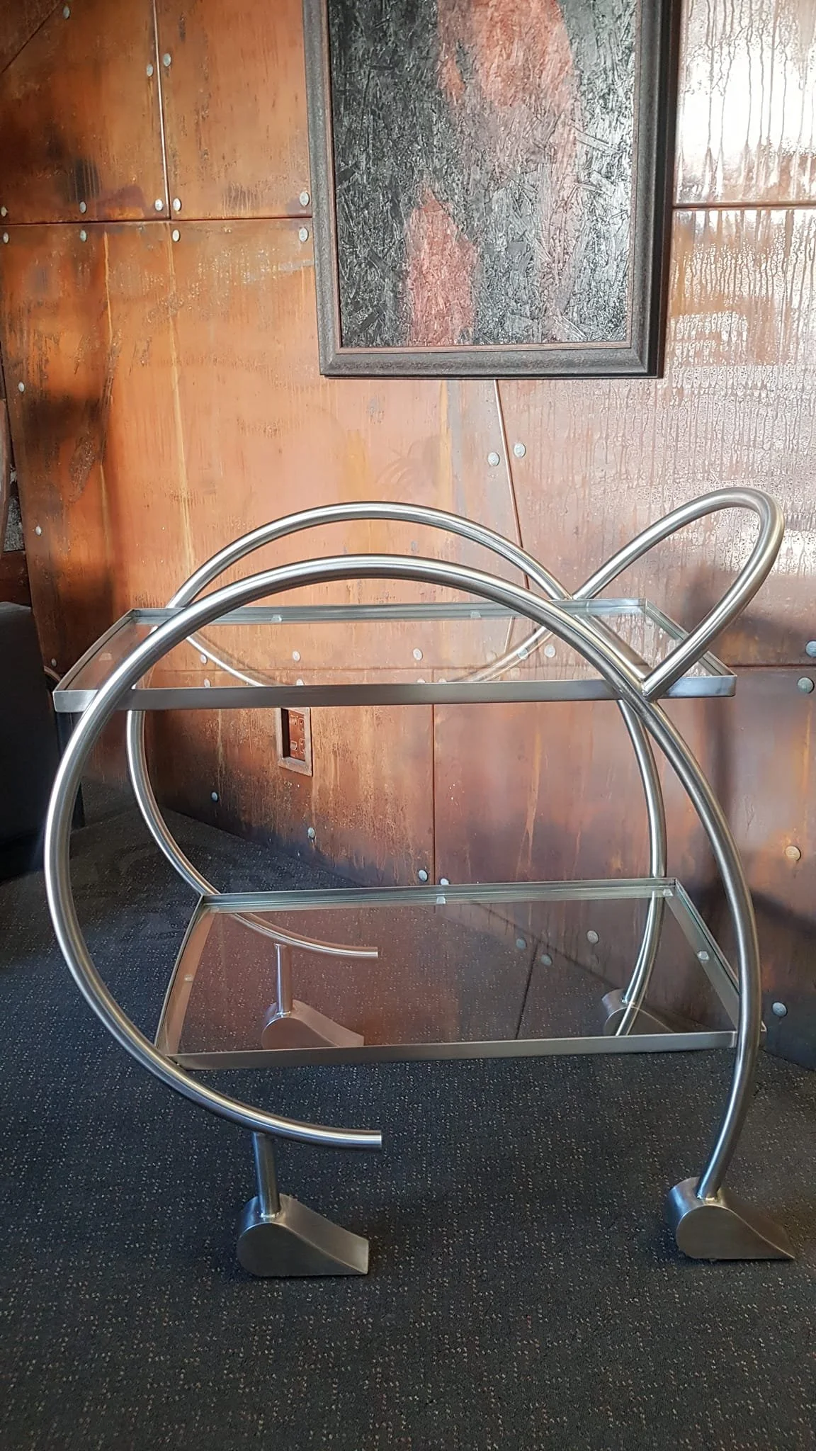 bespoke curved drinks cart made from steel and glass