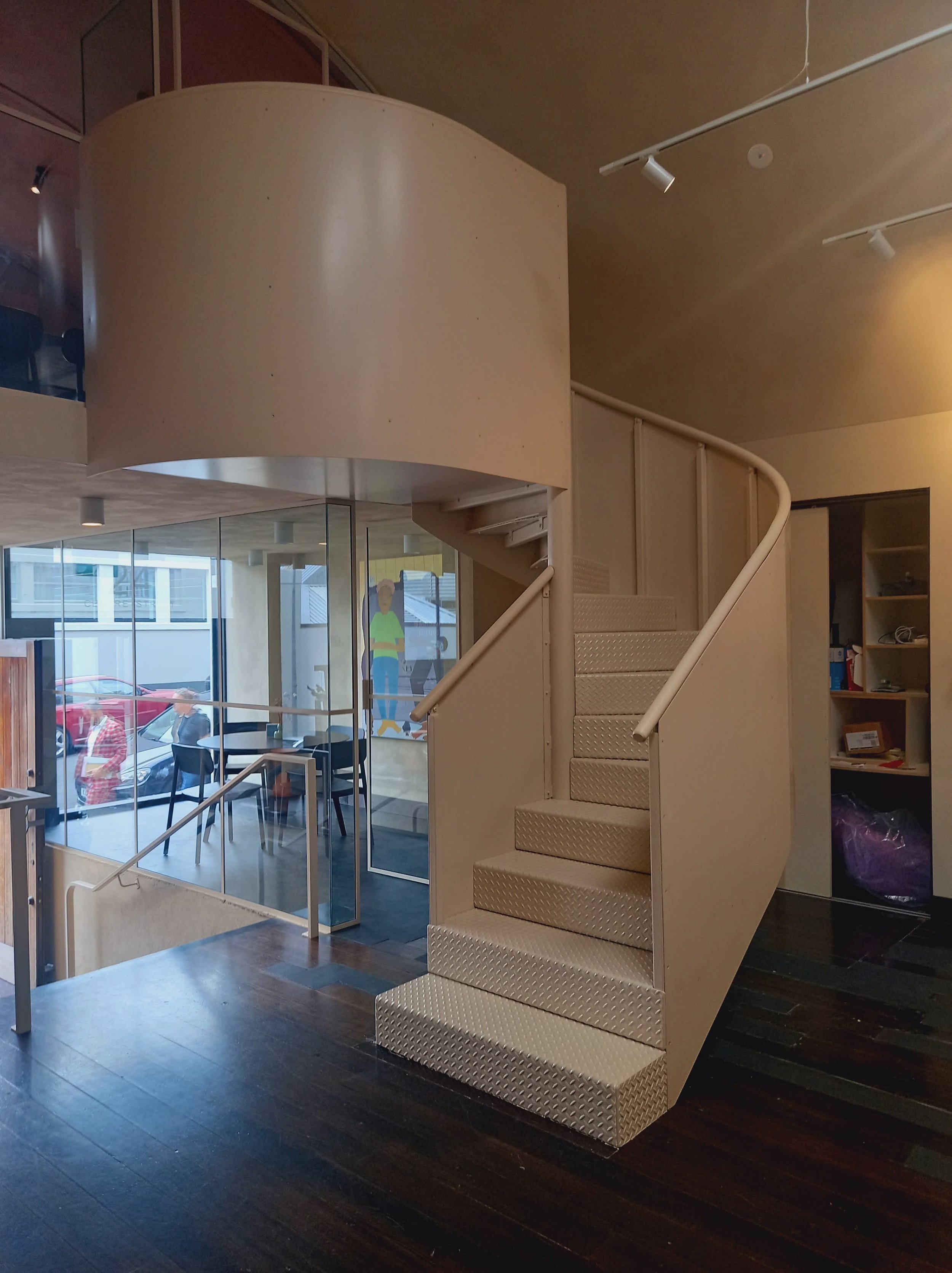 Architectural steelwork - stairway leading to upstairs balcony