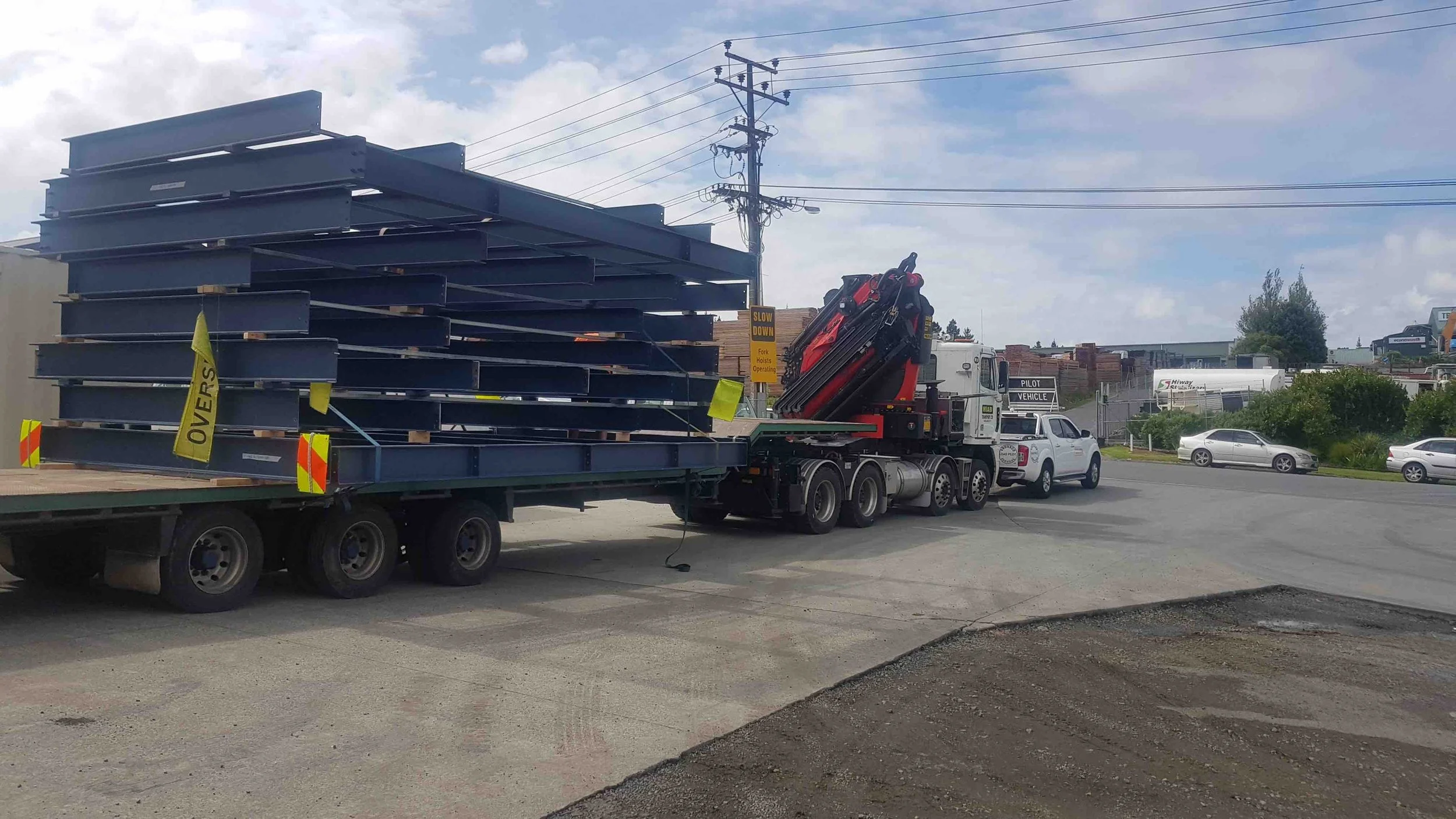 a large truck delivering a big load of heavy steel frames in Silverdale