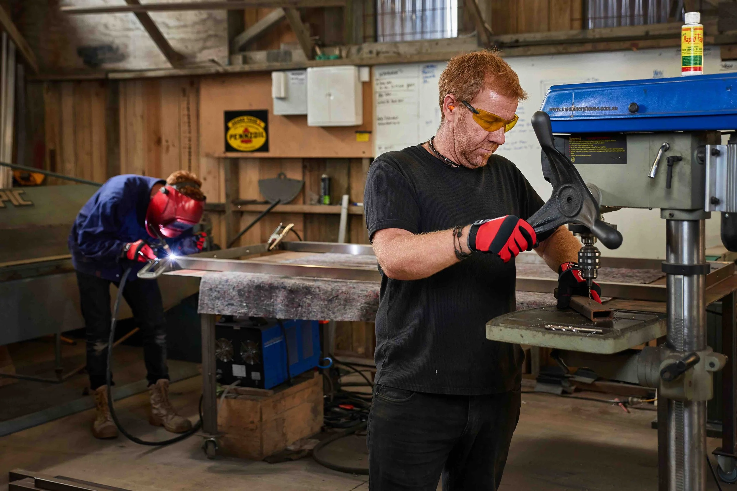 Fabricators working on steel