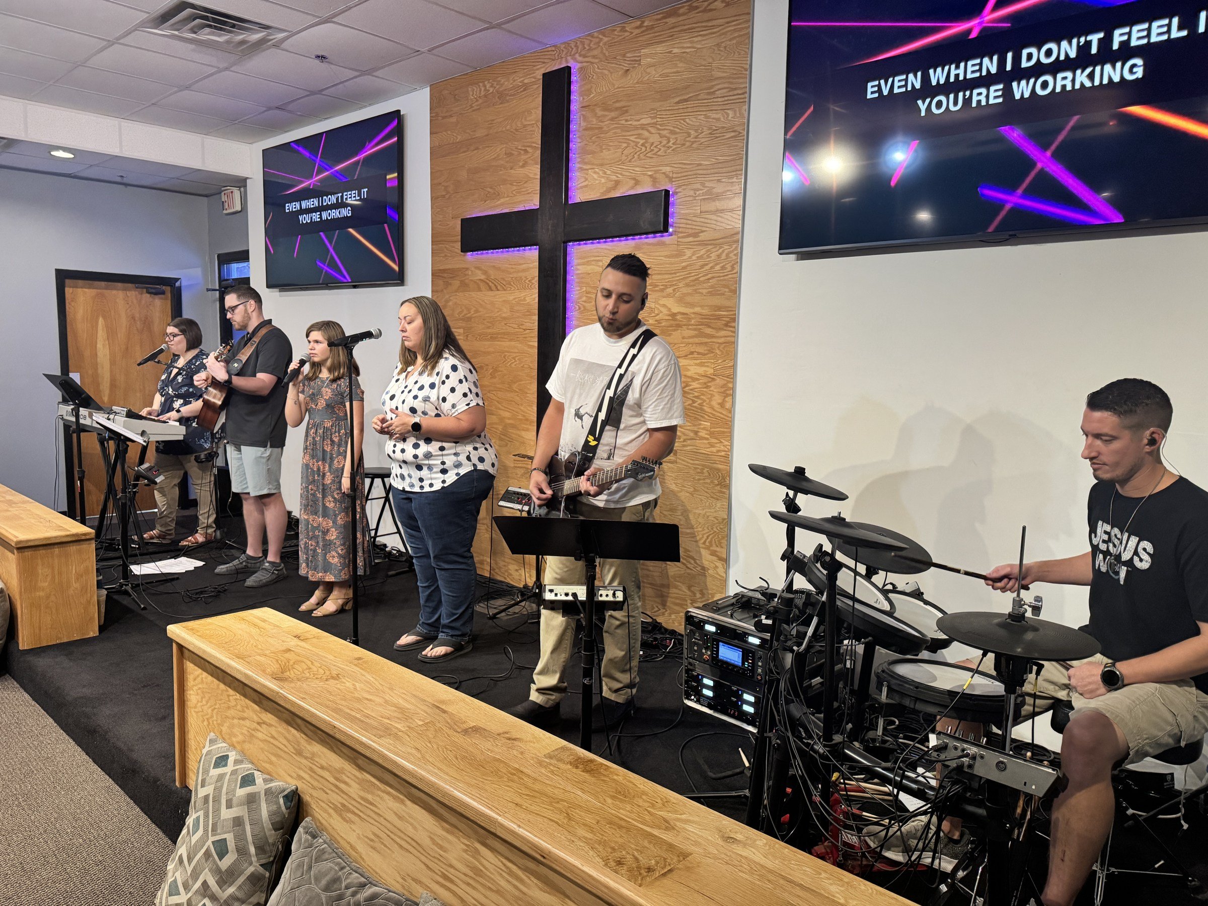 The Restoring Hope worship team leading the congregation in song.