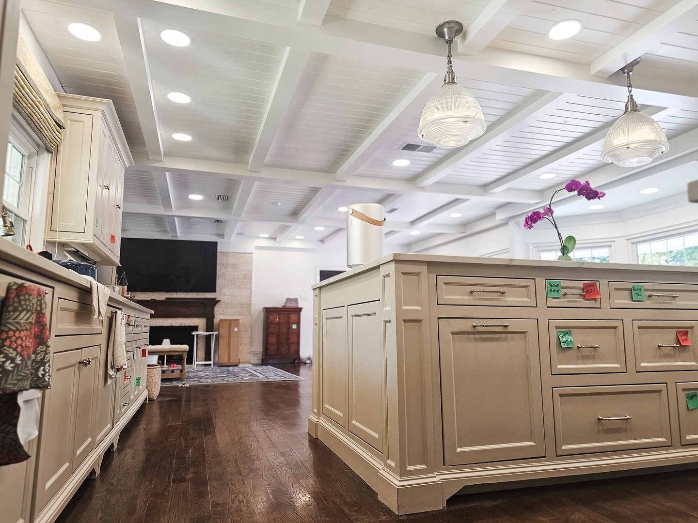 Our electricians are the best in the business! They replaced all of the lights in this home and really made this coffered ceiling shine bright. ✨ We love what we do! Give us a call!