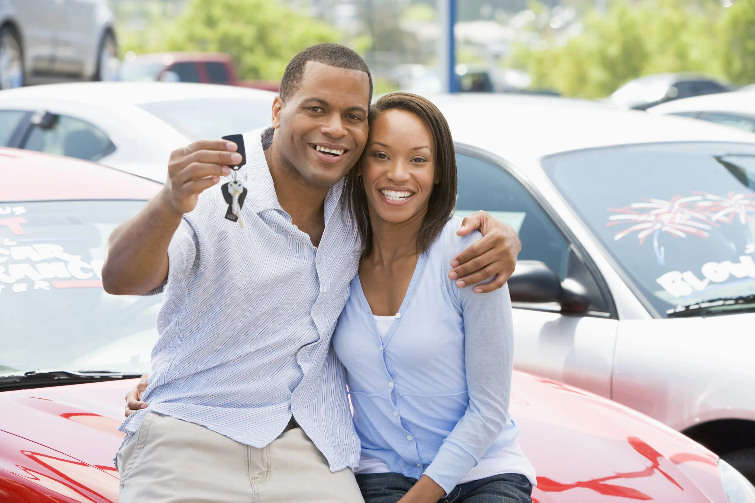 bigstock-Couple-Sat-On-Car-With-Keys-3915591.jpg