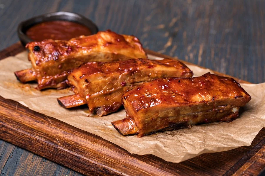 bigstock-Grilled-pork-ribs-in-barbecue--231040753.jpg