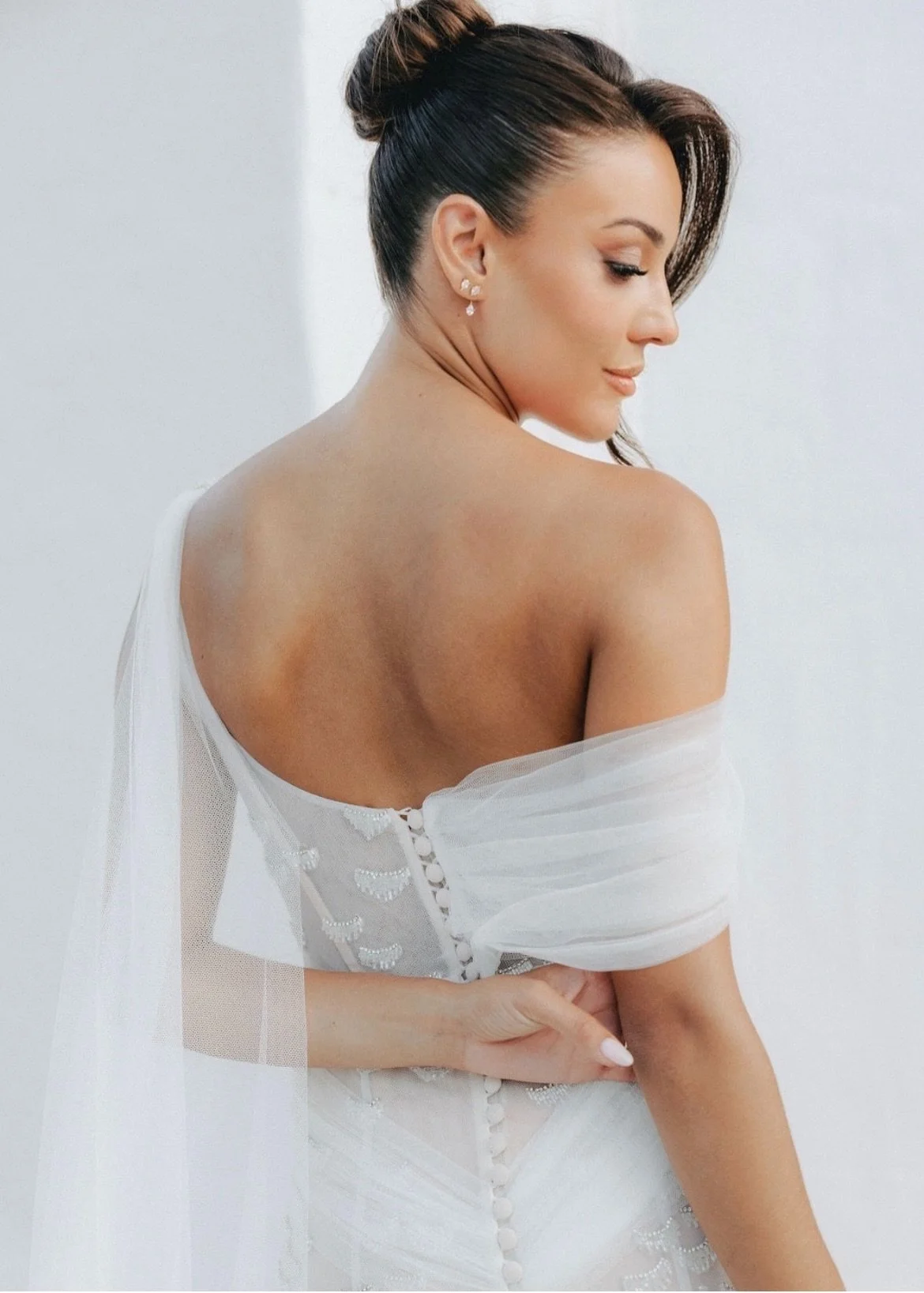 Soft, sculpted bridal makeup for a destination wedding in Puglia, Italy, photographed at Masseria Borgo Ritella.