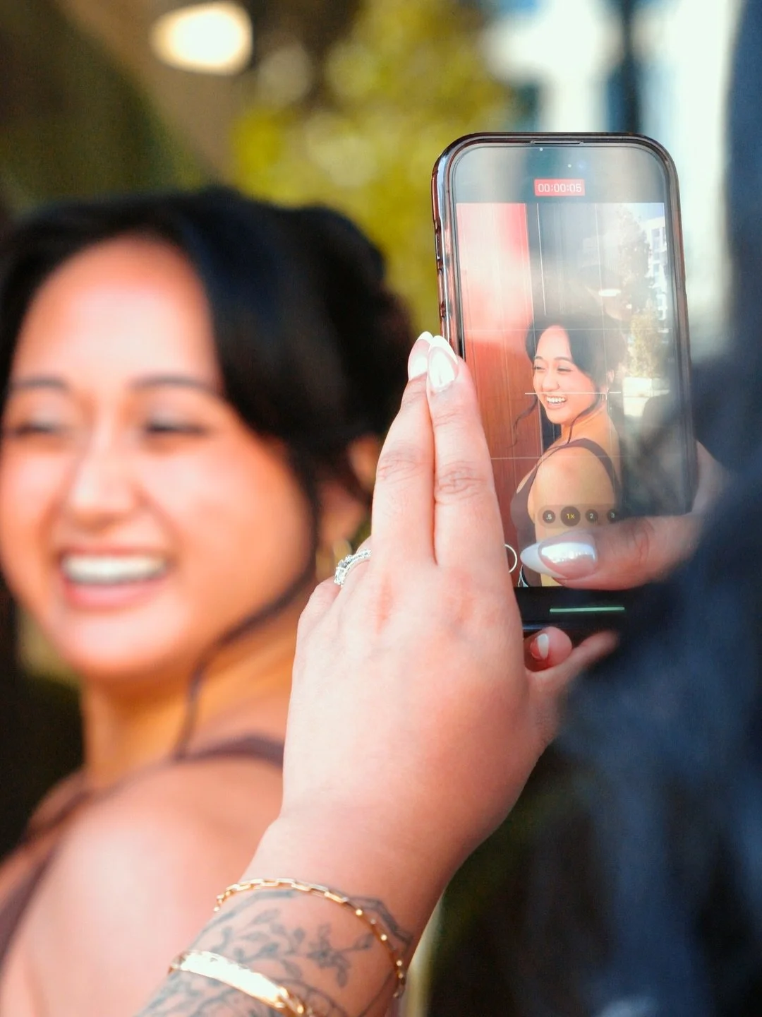 A new POV from @hwin.photos. Thanks for capturing this moment of my bridal inspired hair and makeup look! Can you guess what I ask my clients to get them to smile this big? 🤭