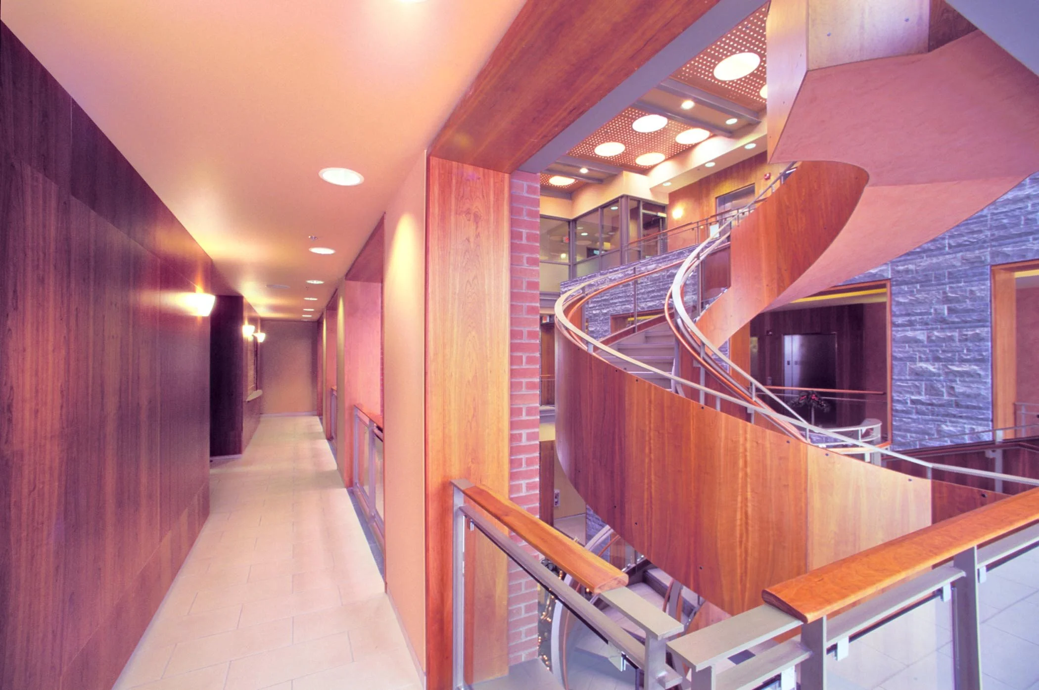 Kingston KFL&A Health Unit hallway and spiral staircase. Project by Shoalts and Zaback Architects.