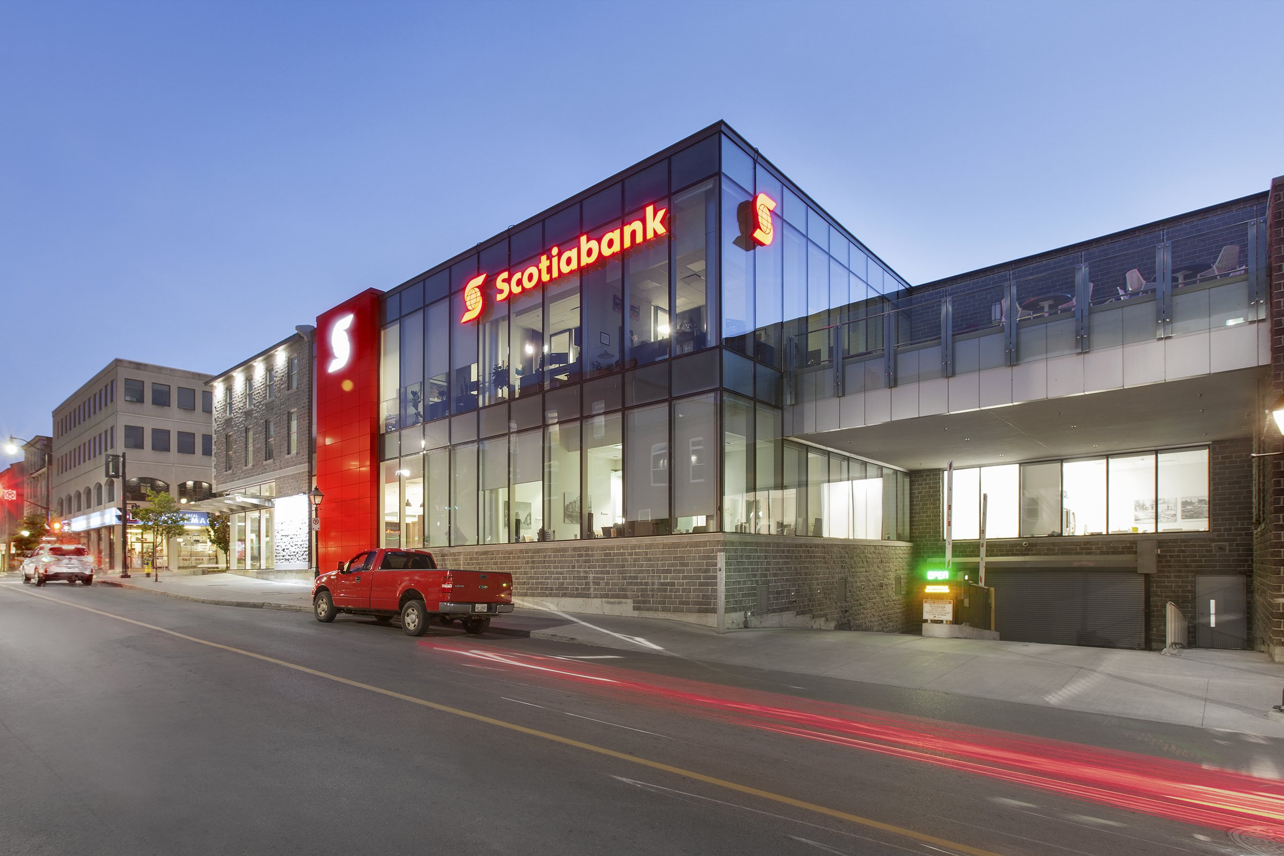 Downtown Kingston at dusk exterior of Scotia Bank project by Shoalts and Zaback Architects.