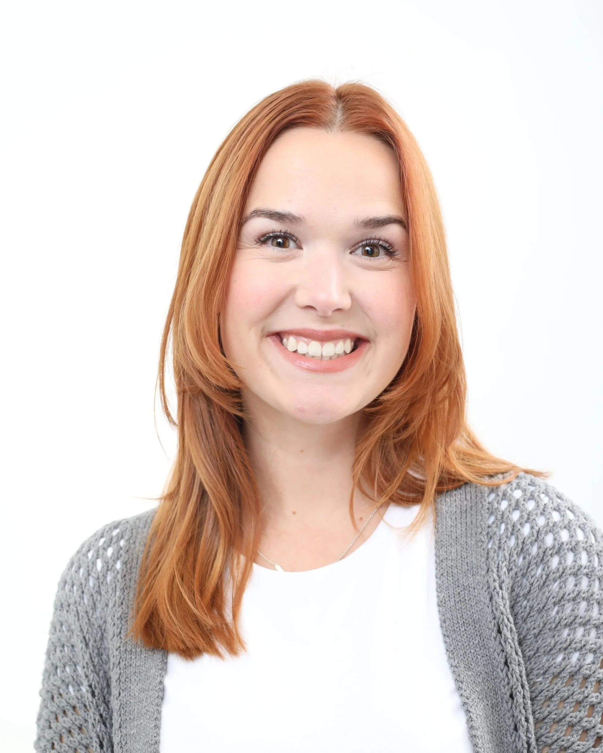 headshot of woman with red hair