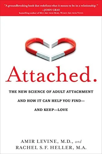 Book cover of 'Attached: The New Science of Adult Attachment' by Amir Levine and Rachel Heller. Features a heart-shaped magnet and a quote from John Gray.