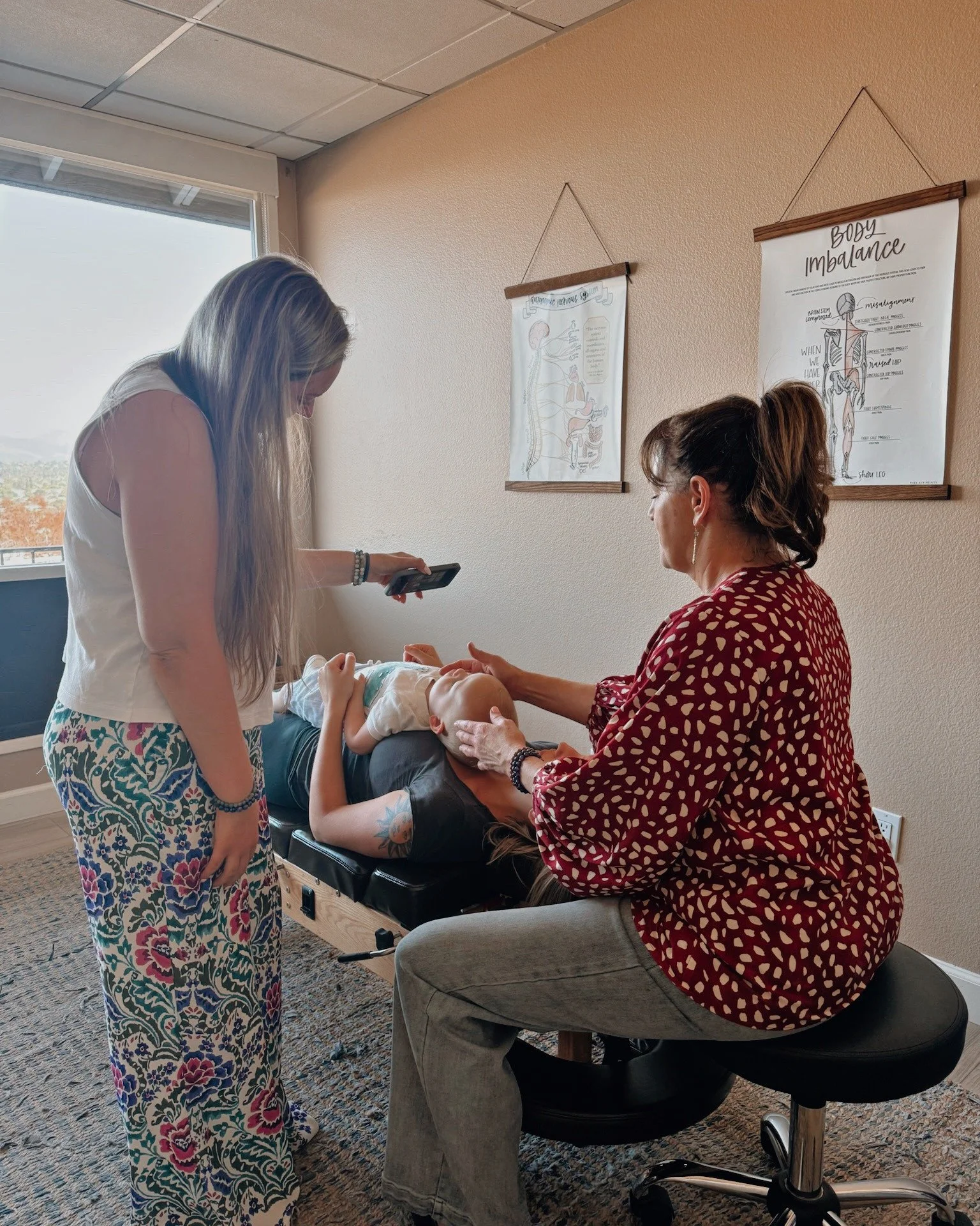 Whatever it takes to get the adjustment 😂💛

Snacks, singing, toys, phones, funny noises, tag-team parenting&hellip;
pediatric chiropractic care is definitely a team effort sometimes 🤝✨

But helping kids feel safe, connected, and regulated during c