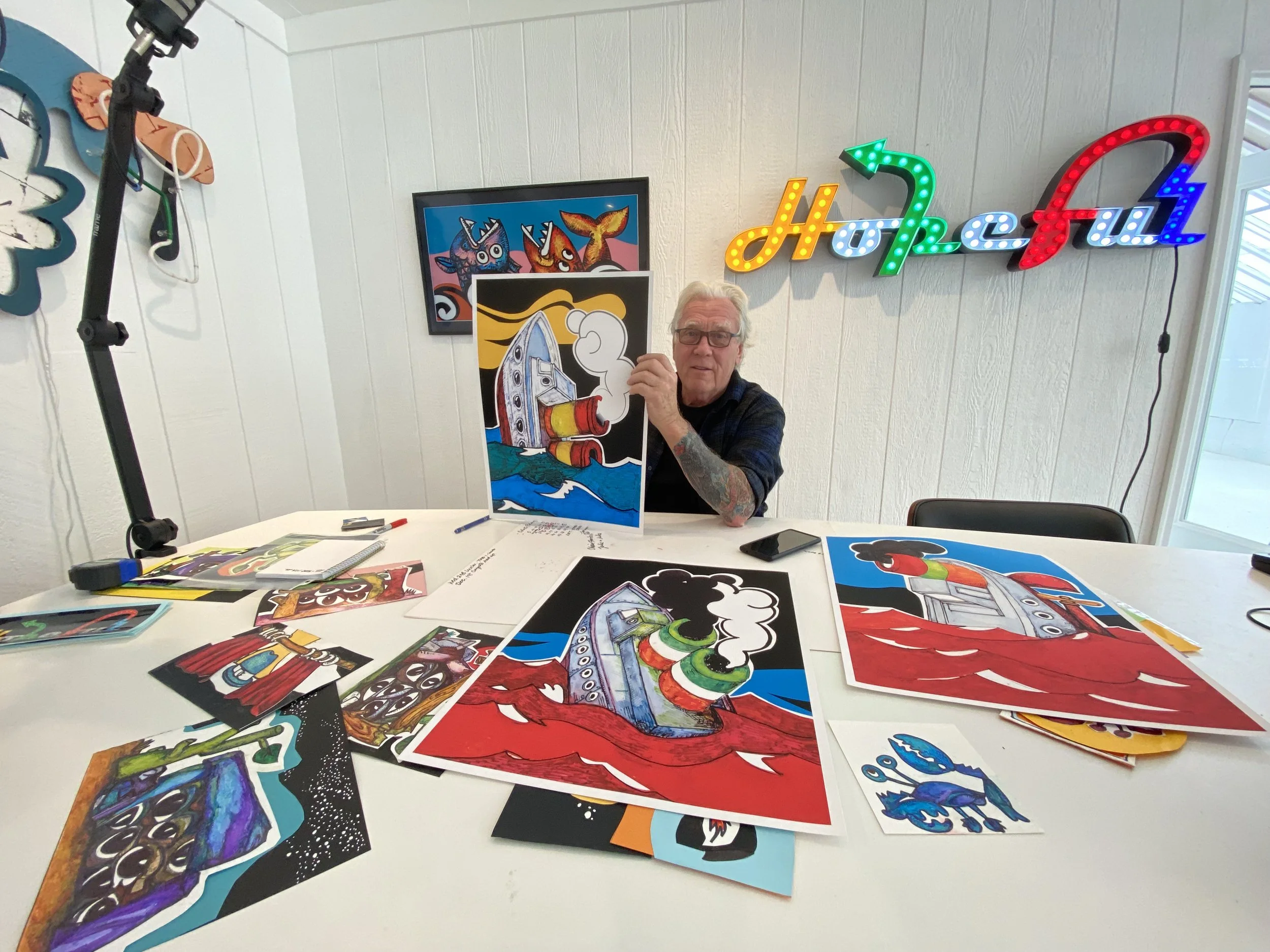 Charlie presenting one of his favorite drawings from this second phase of his NFT collection.