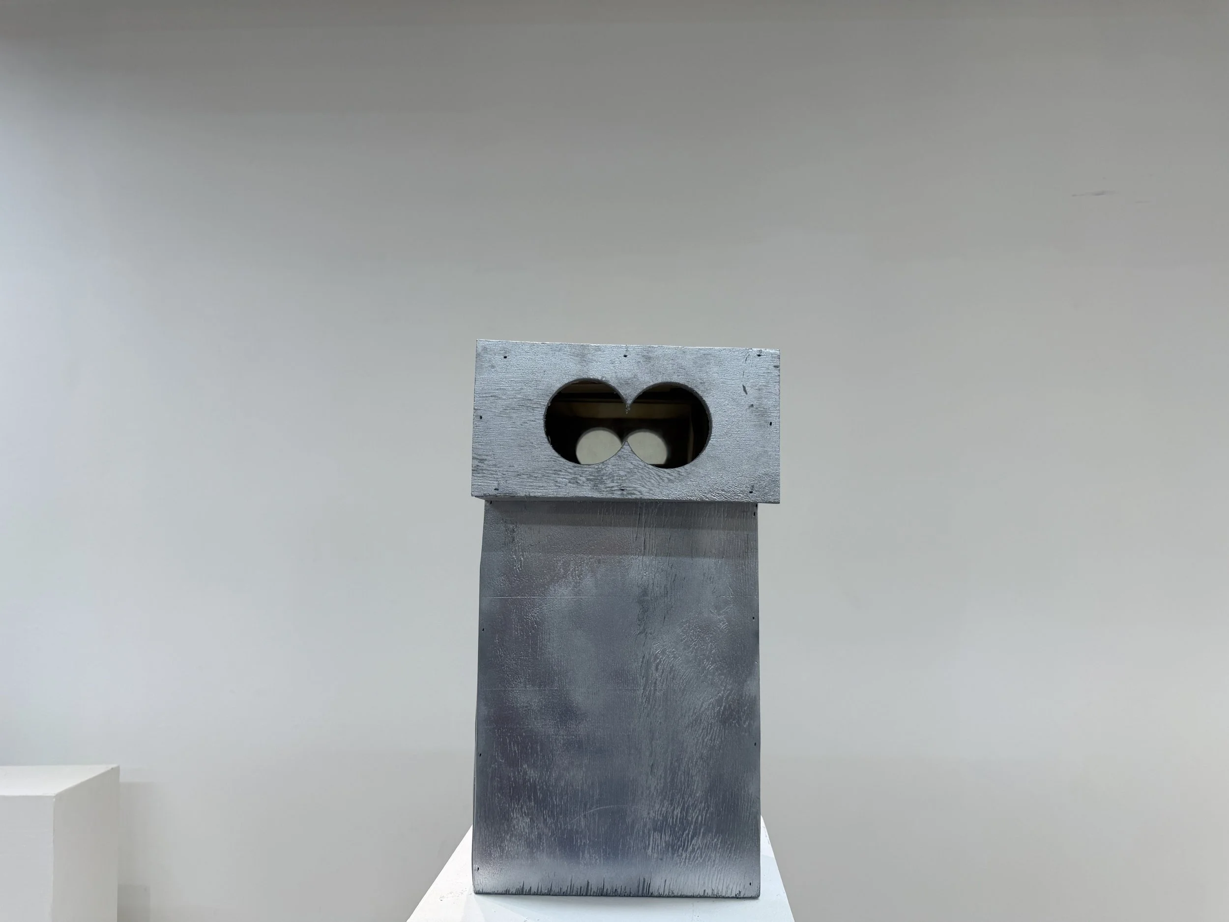 Personal Peeper, 2026, Wood sculpture, 18”x11”x11.5”