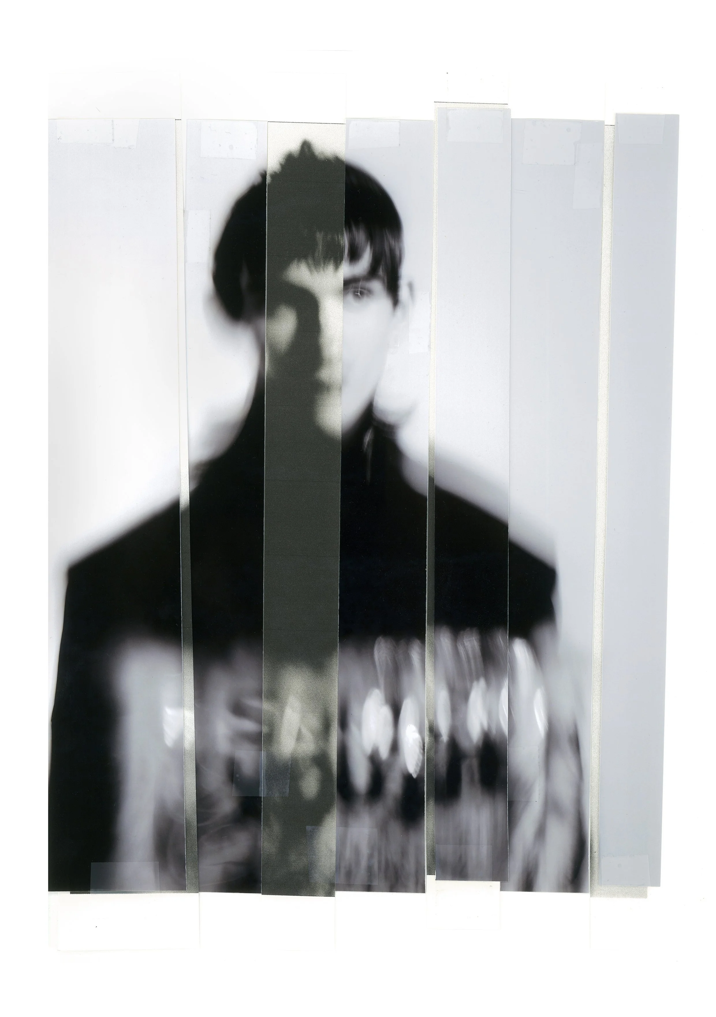 Artistic portrait of a person with a blurred face and abstract vertical segments.