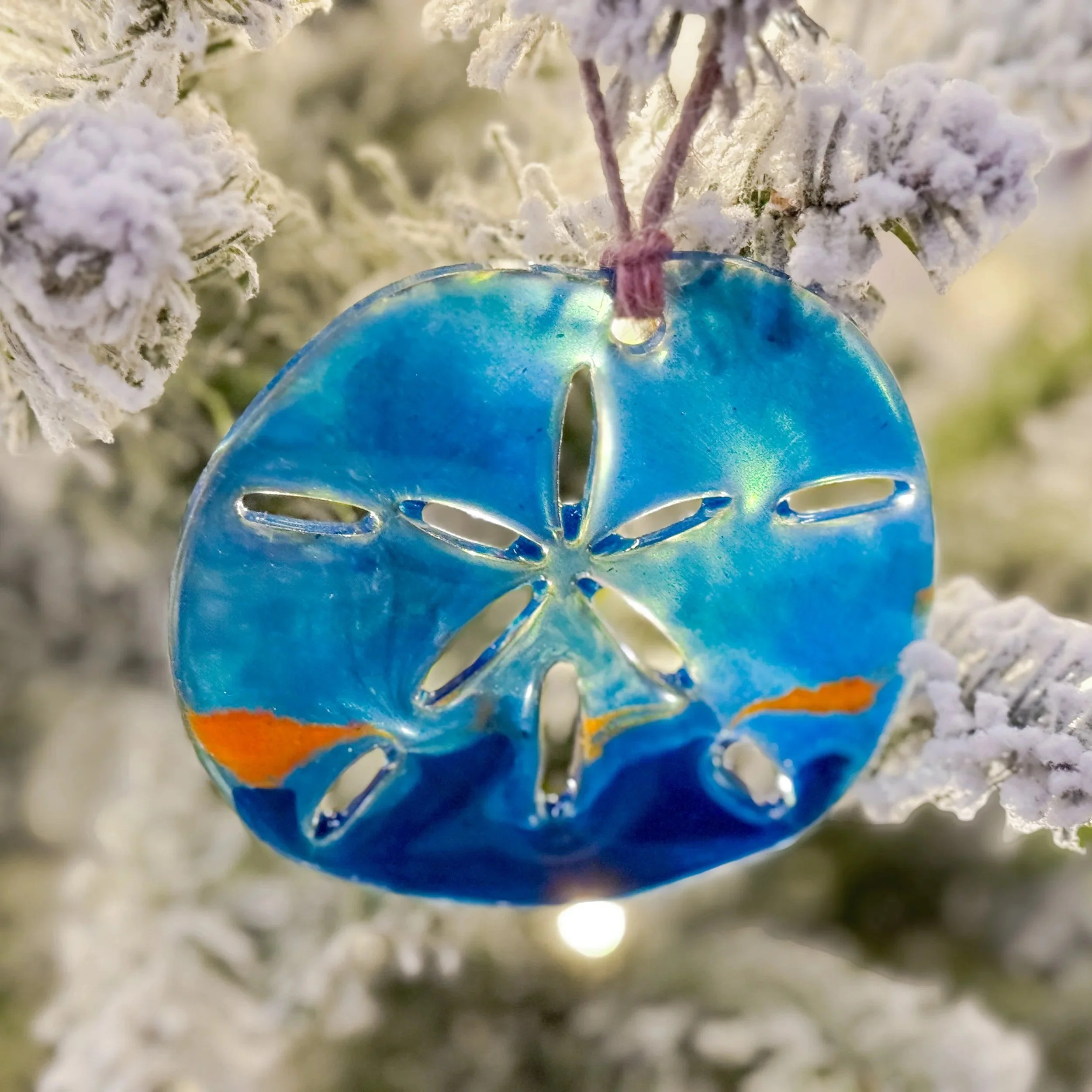 Sand dollar acrylic and epoxy christmas ornament.