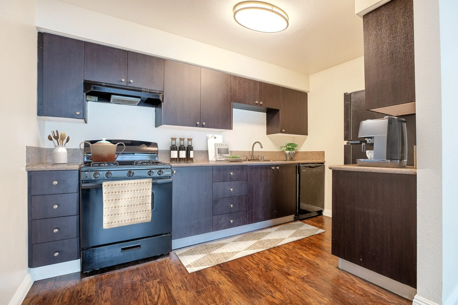 A photo of the kitchen in a one-bedroom/ one bathroom unit. The perfect space to cook. 