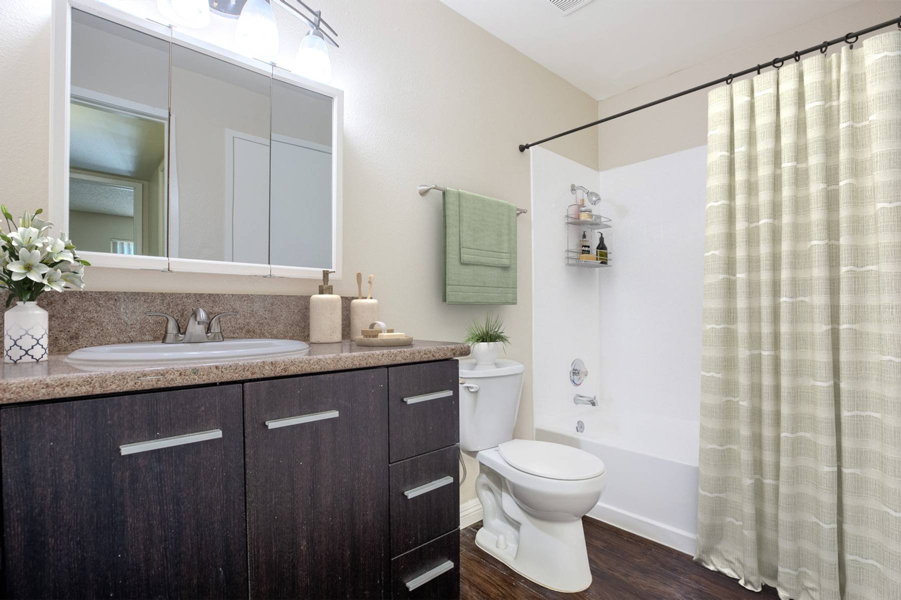 A photo of the bathroom in a one-bedroom/one-bathroom unit. Featuring a Tub/Shower Combo. 