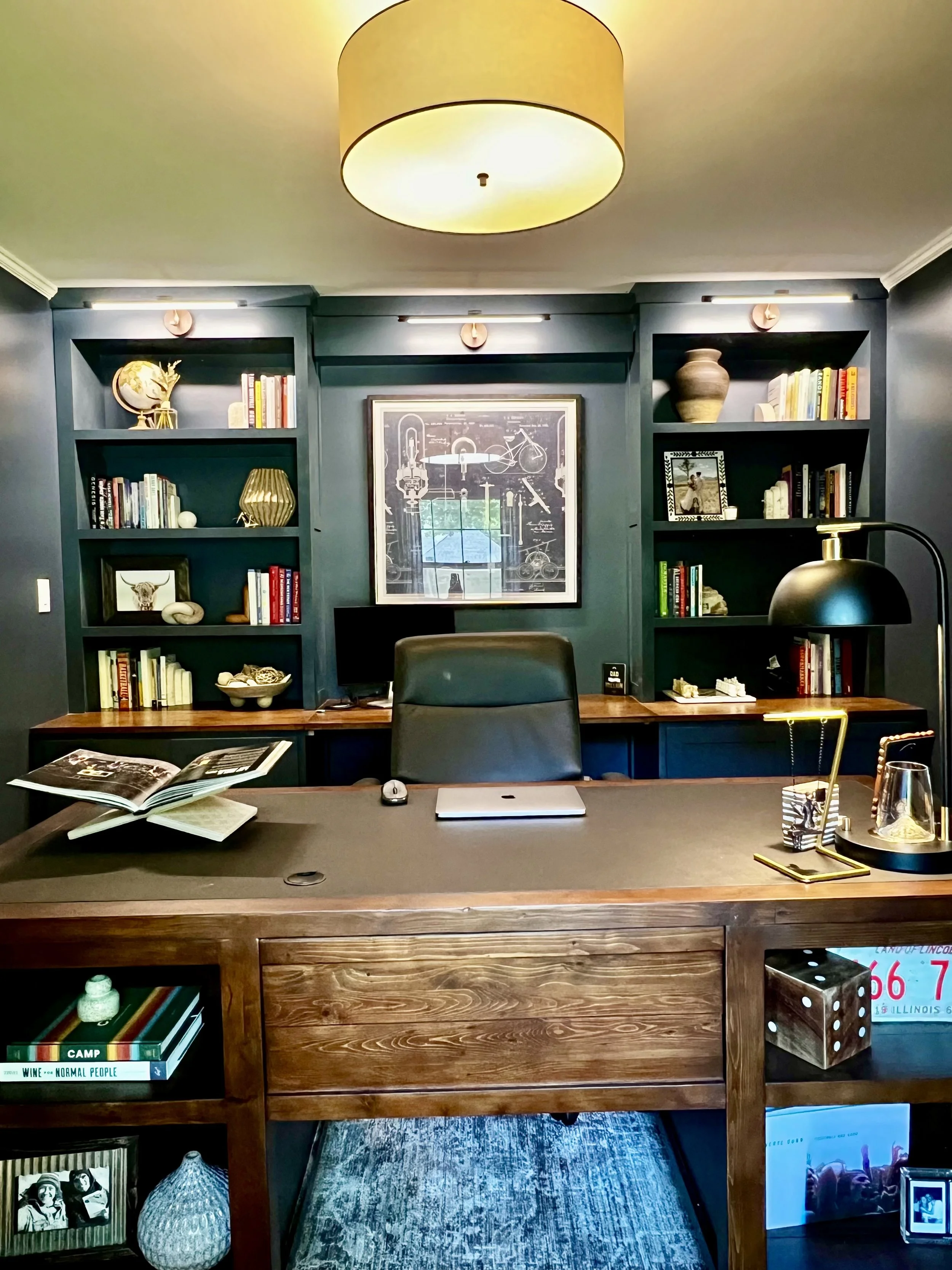 Custom Home Office Built Ins with Oak desktop, base cabinets, and bookshelves