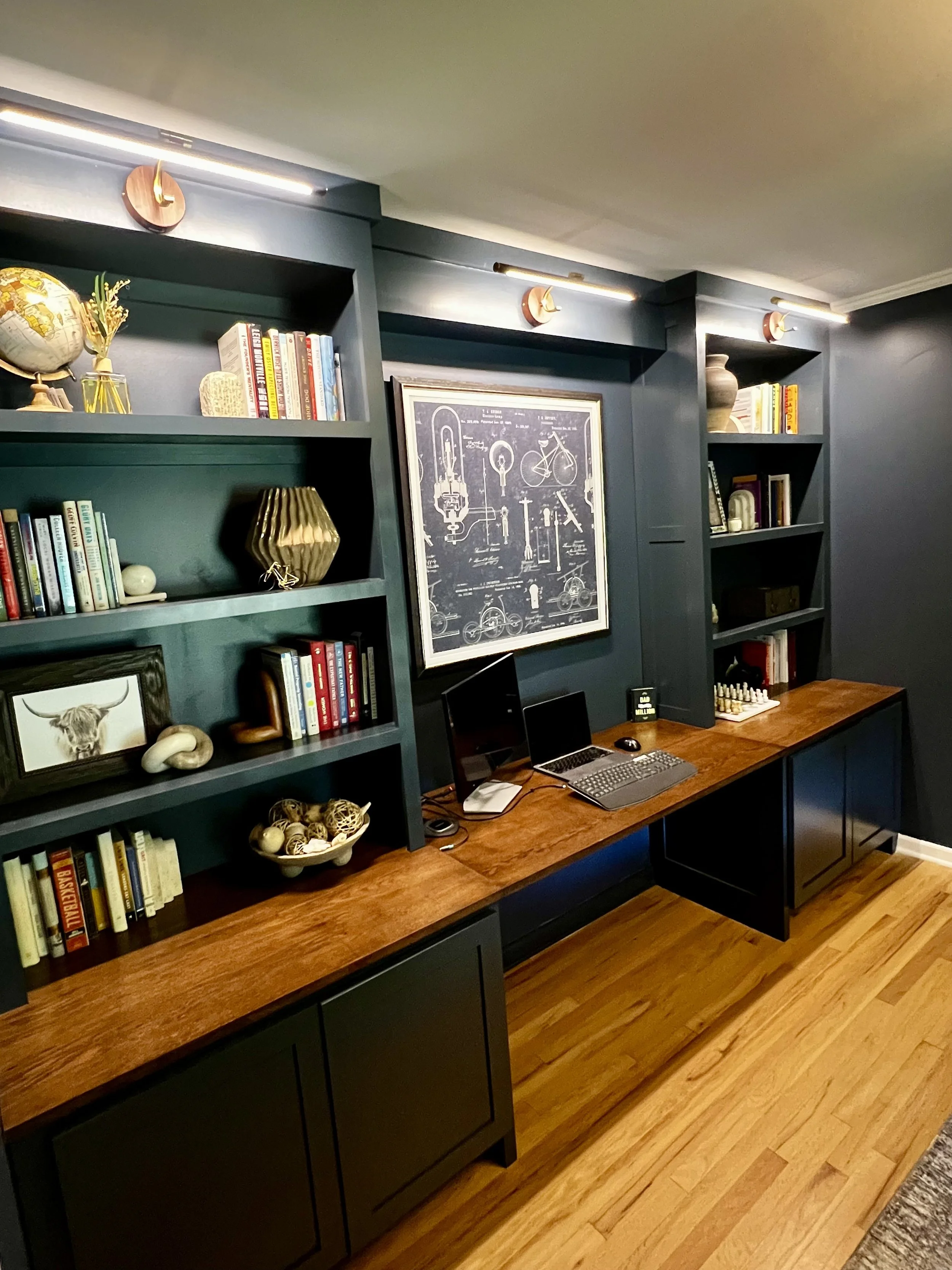 Custom Home Office Built Ins with Oak desktop, base cabinets, and bookshelves