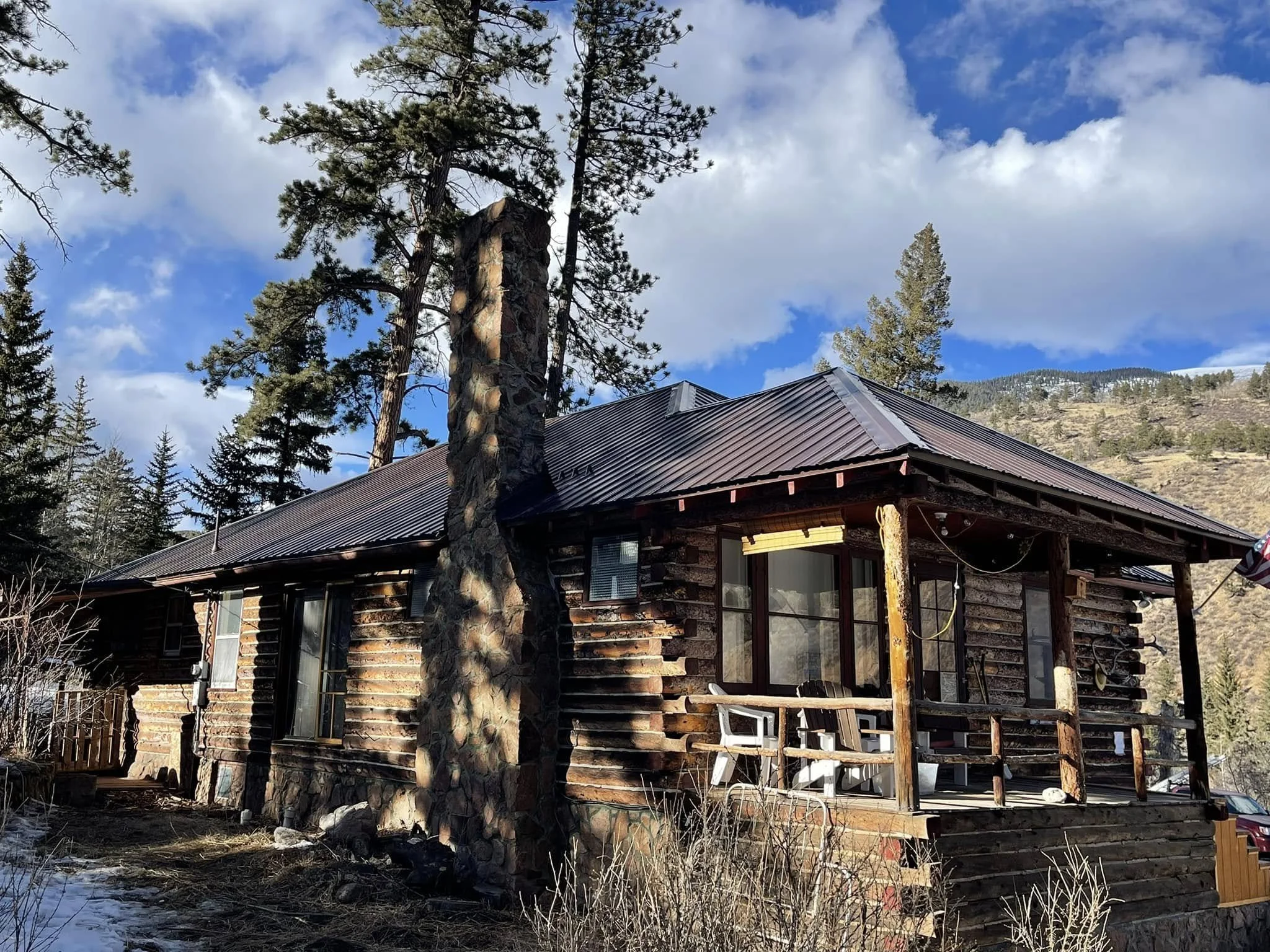 Cabin home with a new roof | roof replacement best time of the year | cheapest time of year for roof replacement | Troost Roofing