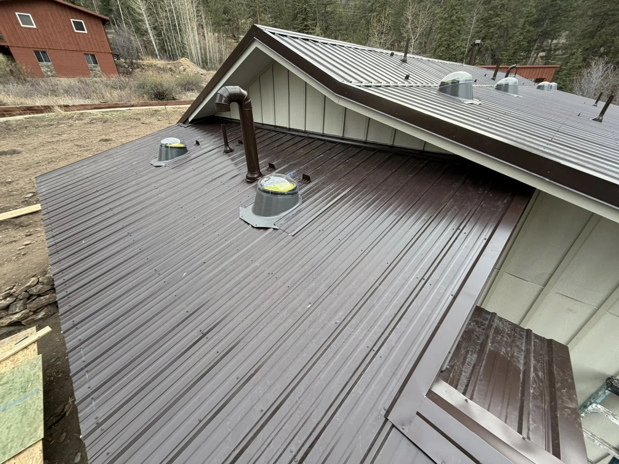 Home with a metal roof | keeping a house cool in extreme heat | Troost Roofing