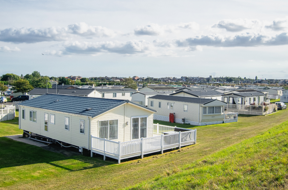 Field of mobile homes that are all white | Mobile home roof replacement | Troost Roofing