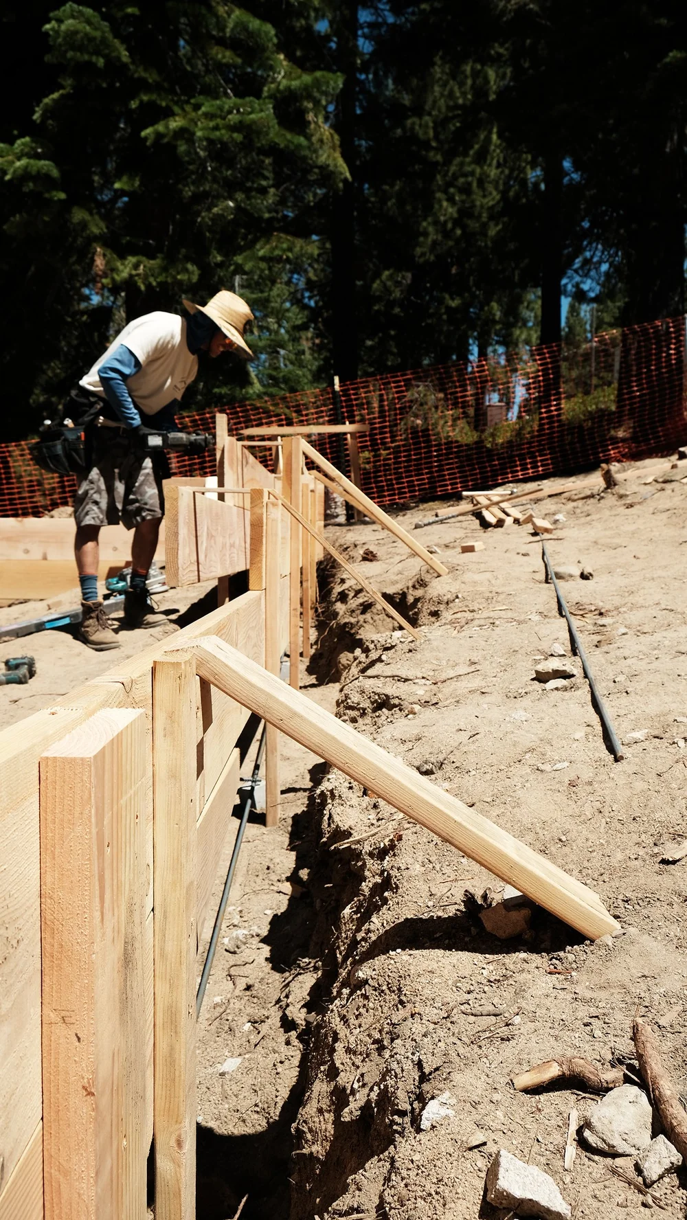 south-shore-custom-builders-apalachee-tear-down-remodel-forming-foundation-downsloping-lot-forms-close-up.jpg