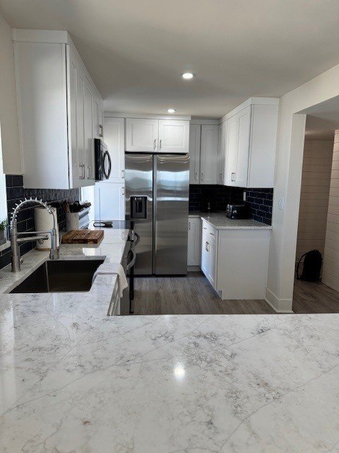 new kitchen with waterfall countertop