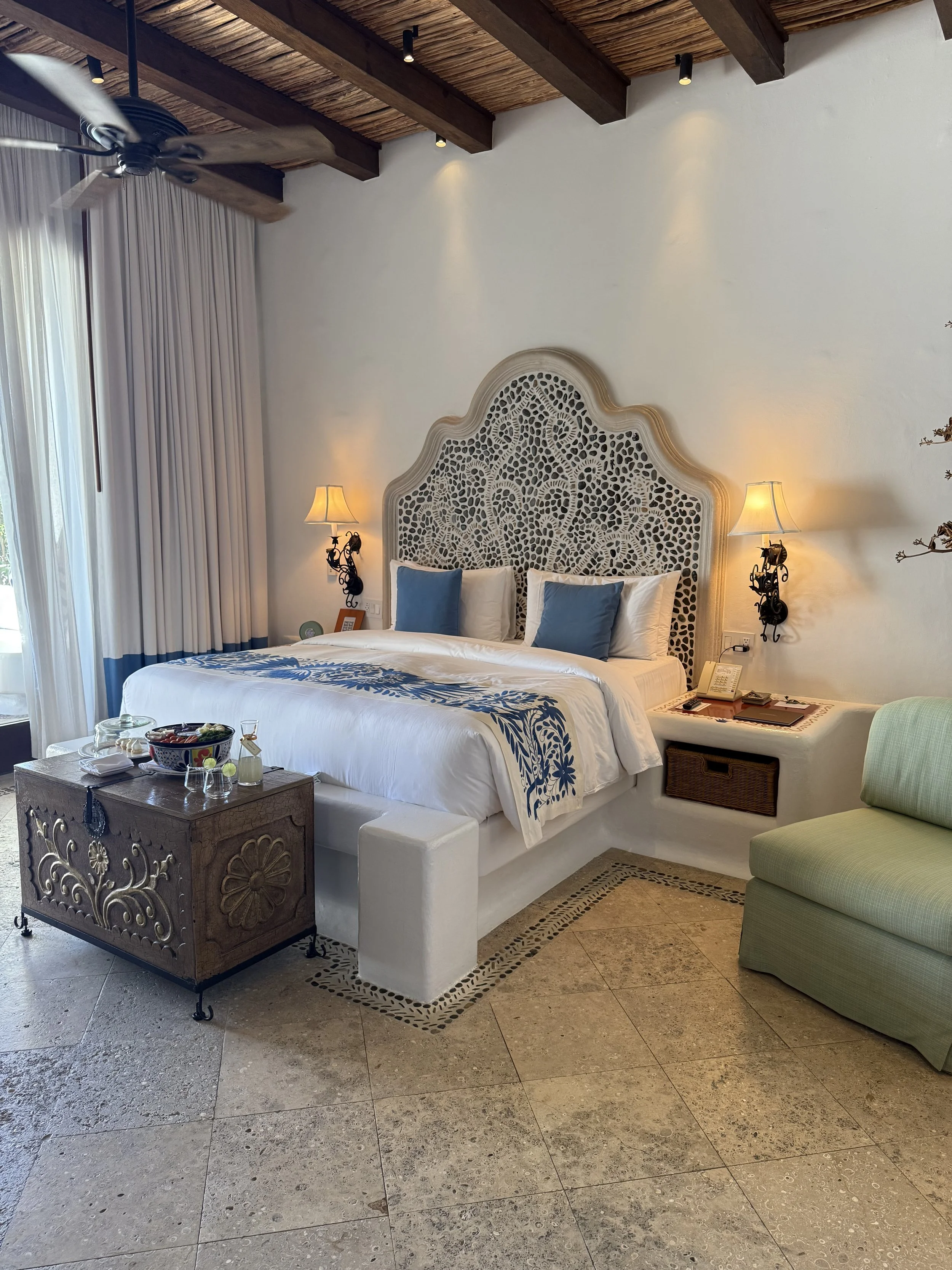 First look at the Ocean View Room - crisp whites, hand-carved details, and local textiles