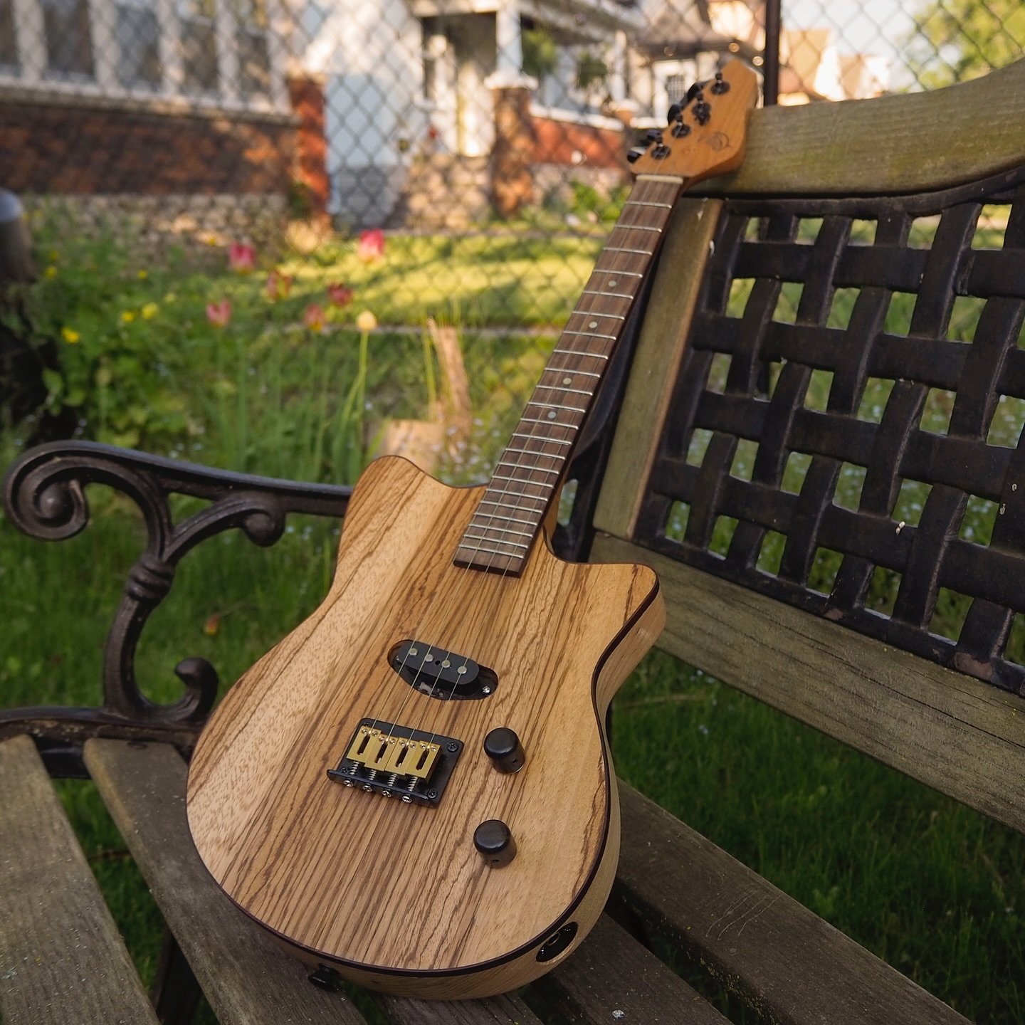 The new electric ukulele basking in our yard. It is now available for purchase and trying. Im glad to have it finished finally and ready for it to find it&rsquo;s forever home!

#ukuleleluthier #ukulele #ukulelelife #electricukulele #ukulelebuilding 