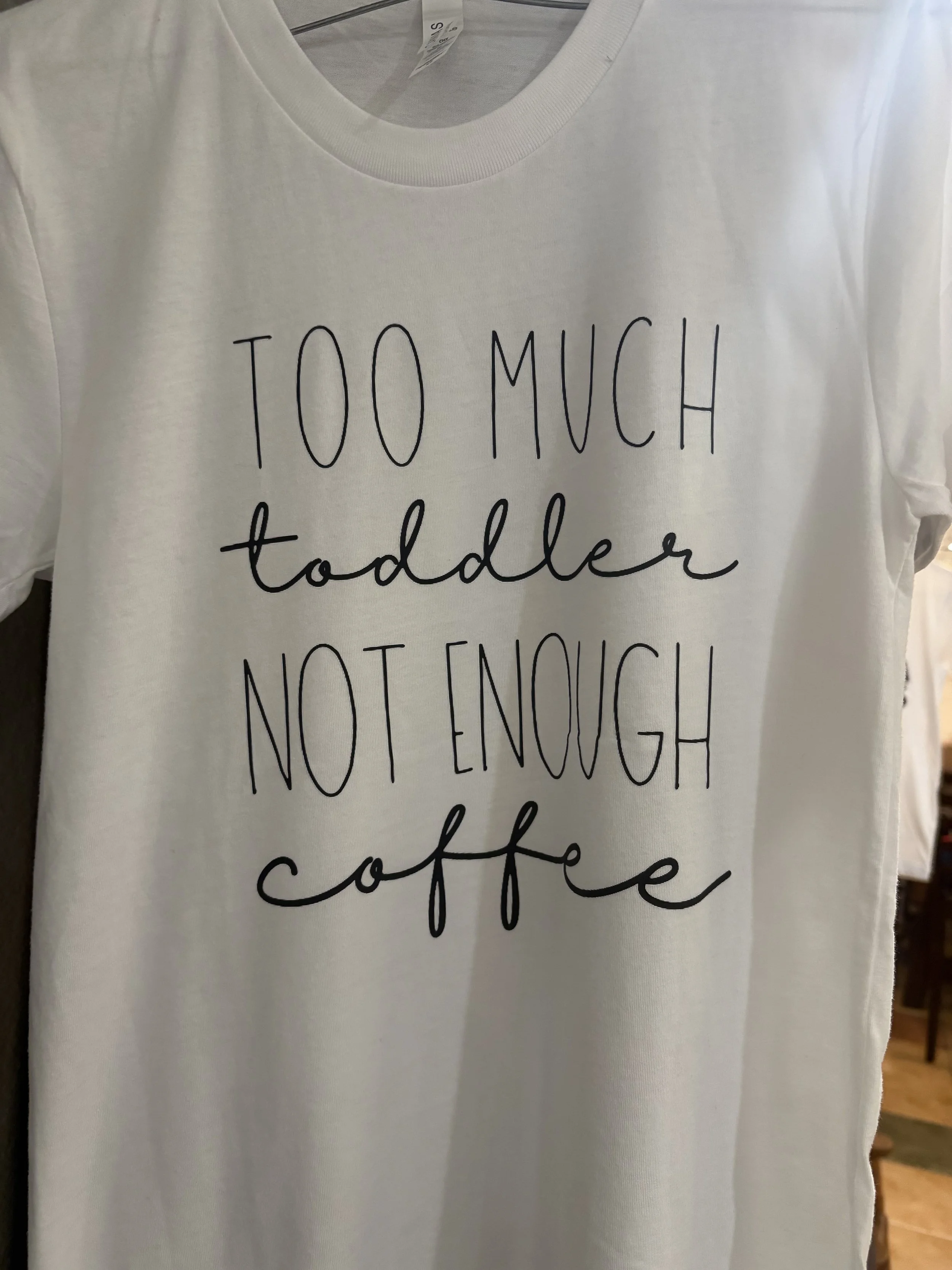 At Noah's, we have the coffee part covered for you! Stop by and grab a cup and this tee that perfectly captures parenthood!